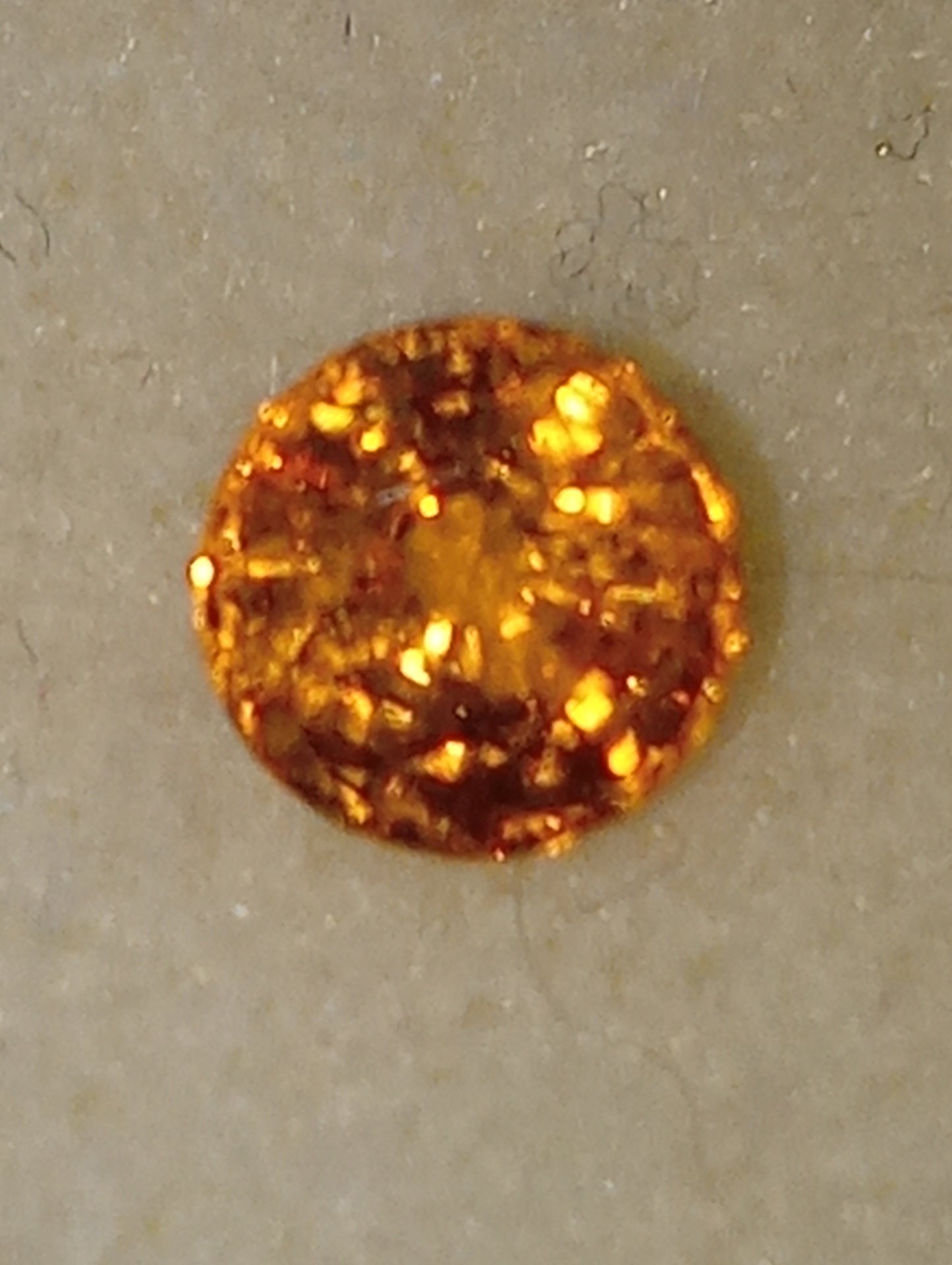 garnet gemstone, mandarin spessartite, 5mm round cut, .81ct