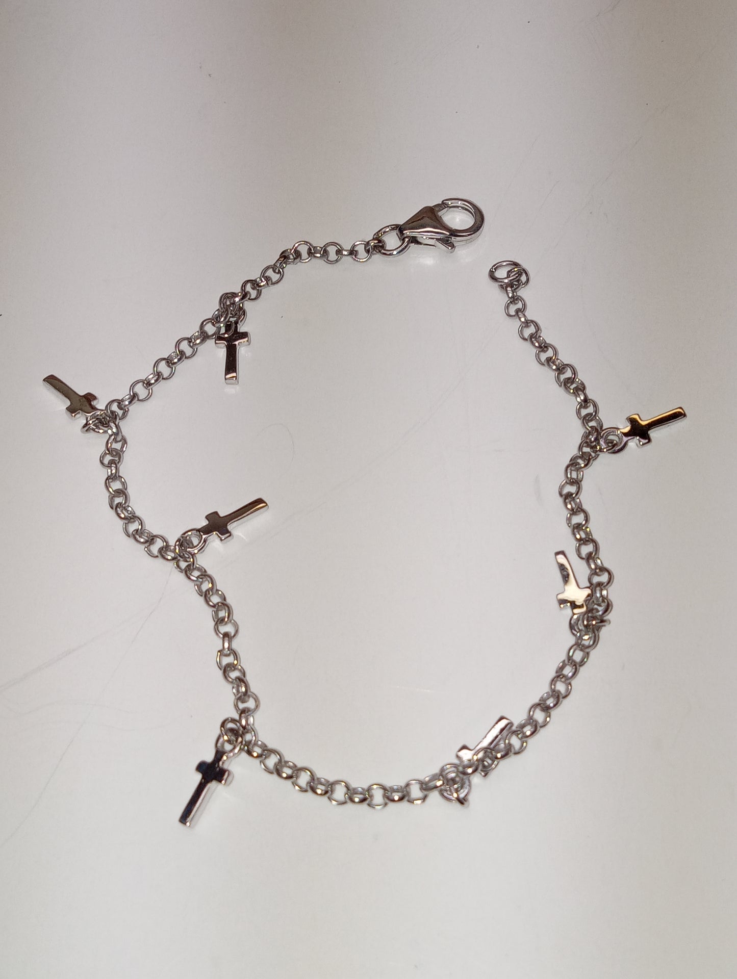 cross charm bracelet