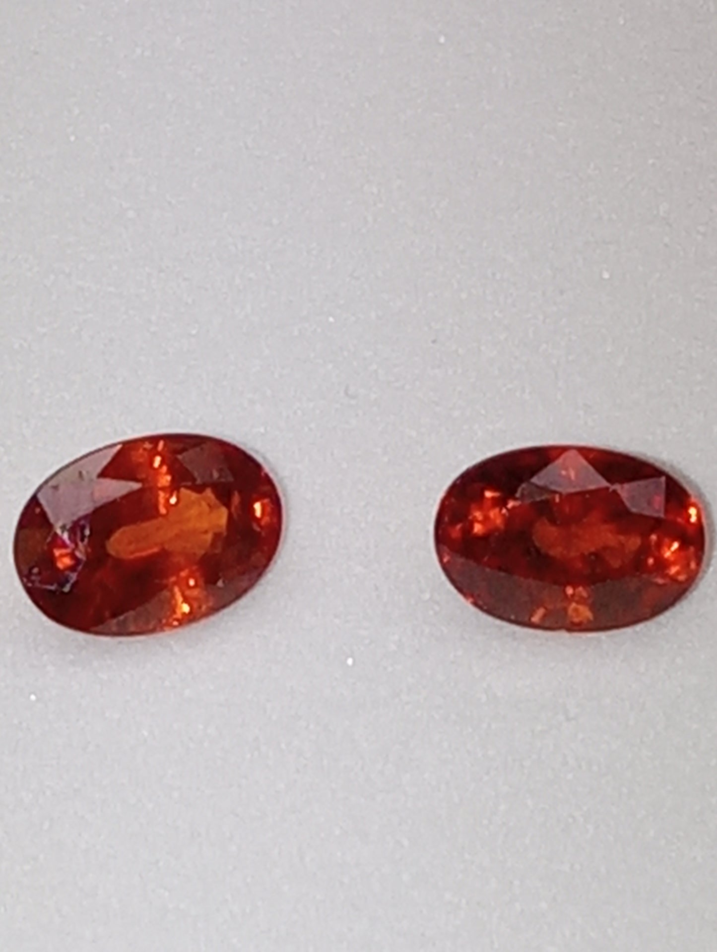garnet gemstones spessartite, 6mmx4mm ovals, 2 stones