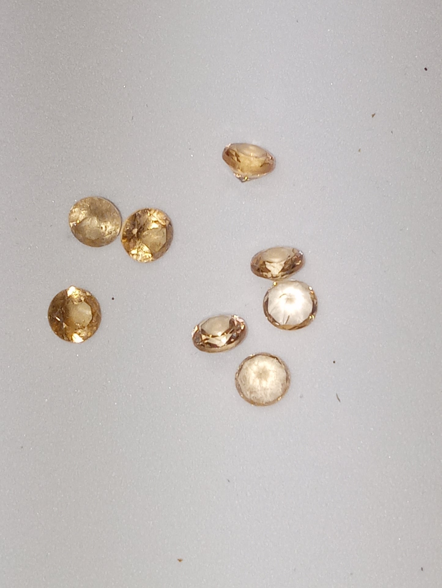 garnet gemstones, Sri Lanka Imperial Hessonite {TM) , 2.5mm-3mm round cut