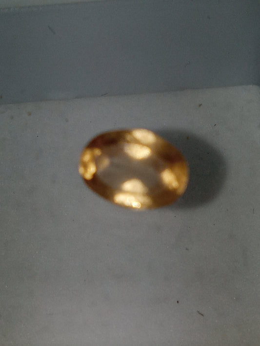 garnet gemstone, Sri Lanka Imperial Hessonite(TM) oval 7mmx5mm