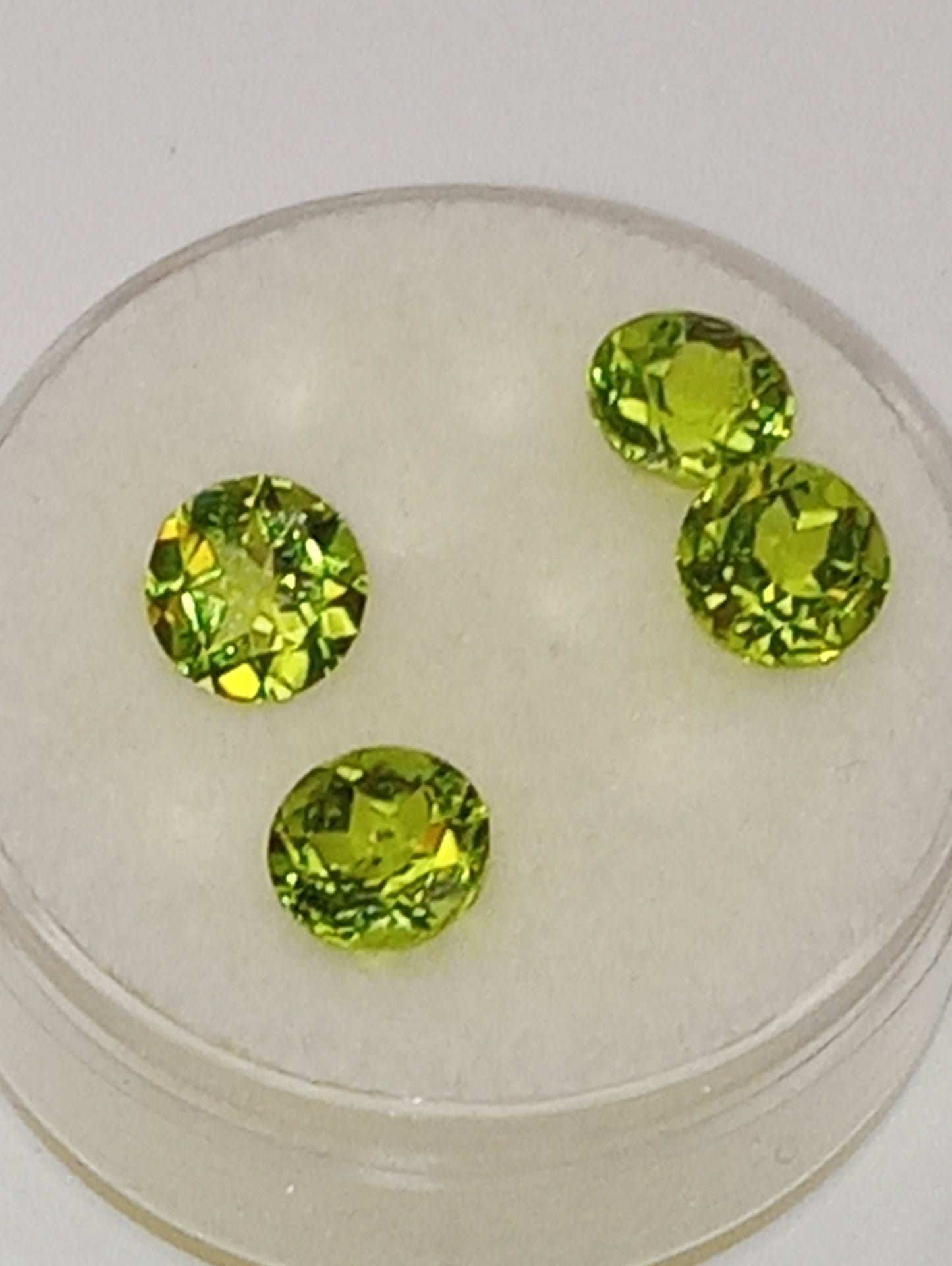 peridot gemstone  7mm rounds 4 stones