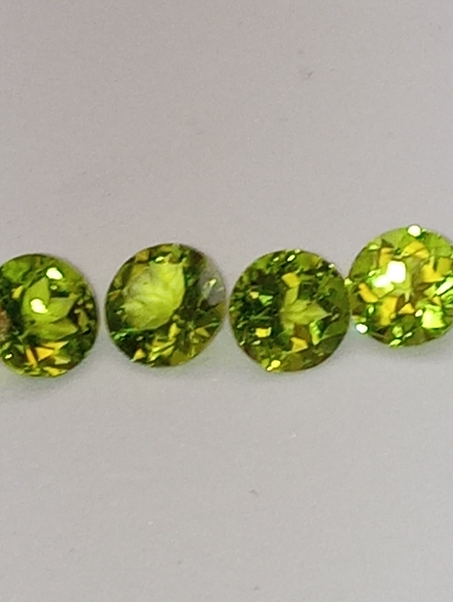peridot gemstone  7mm rounds 4 stones