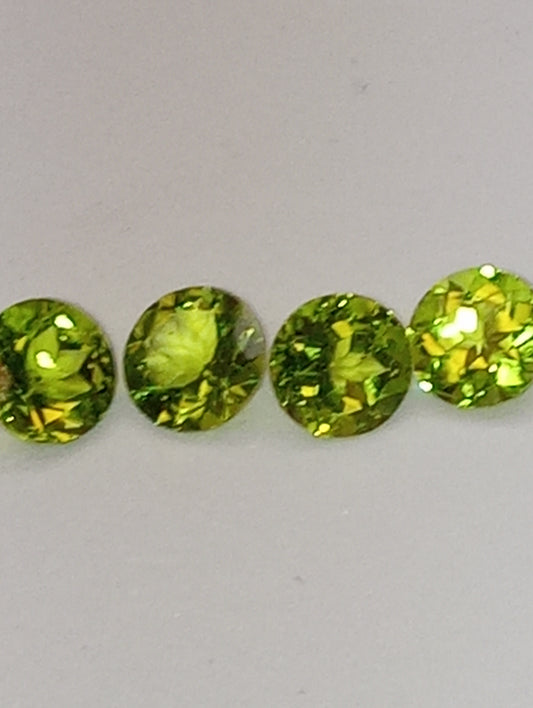 peridot gemstone  7mm rounds 4 stones