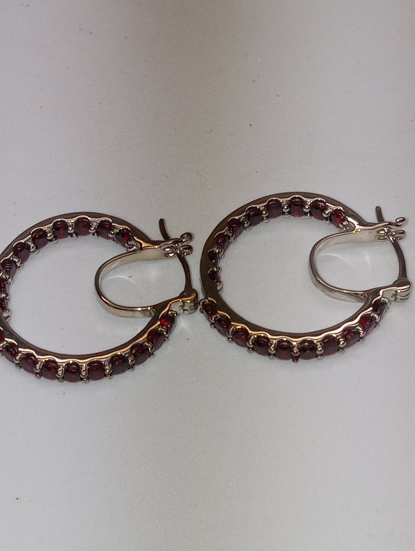 earrings Anthill garnet inside outside hoops in platinum over sterling silver