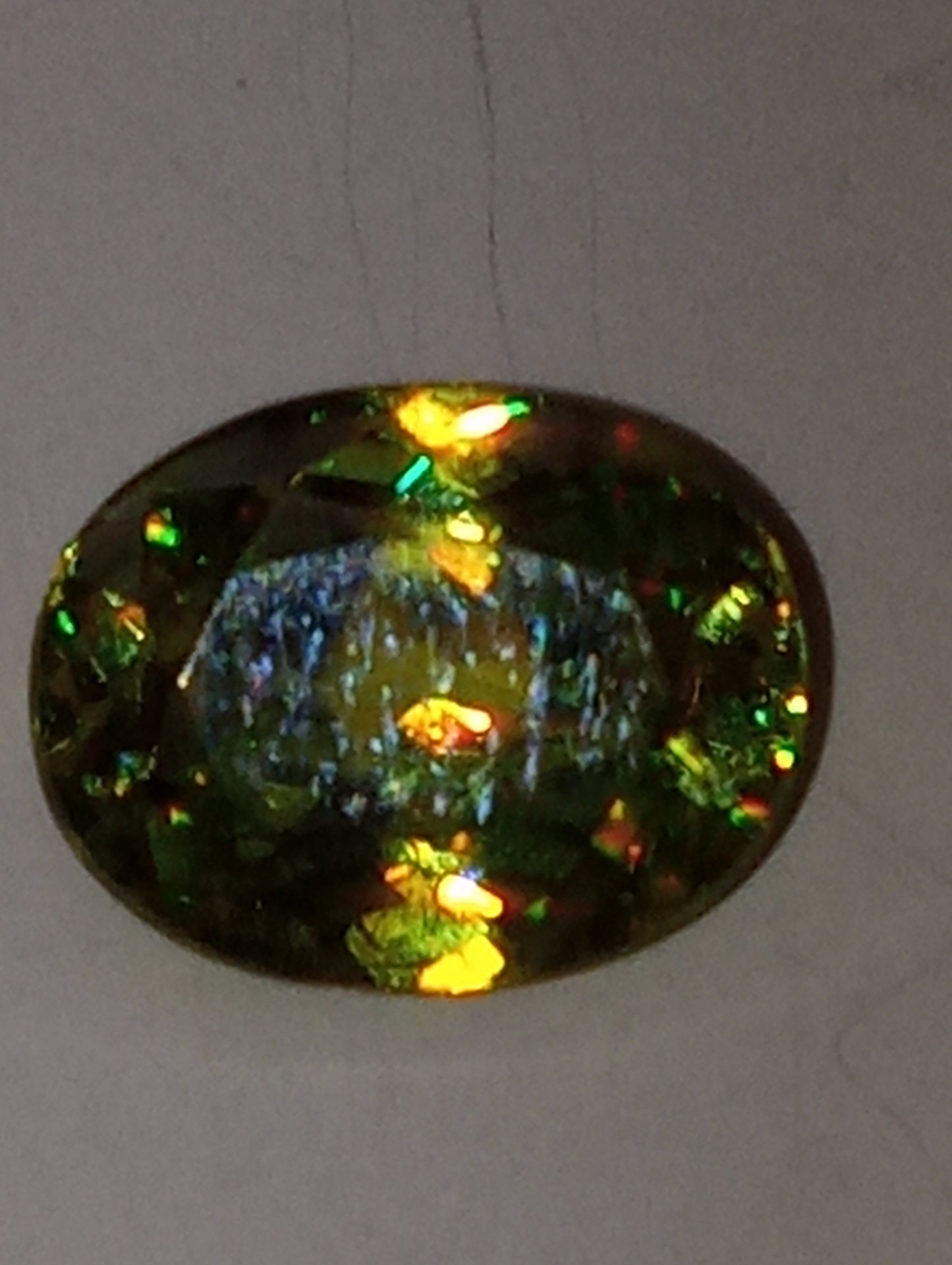 sphene gemstone oval cut, 1.98ct