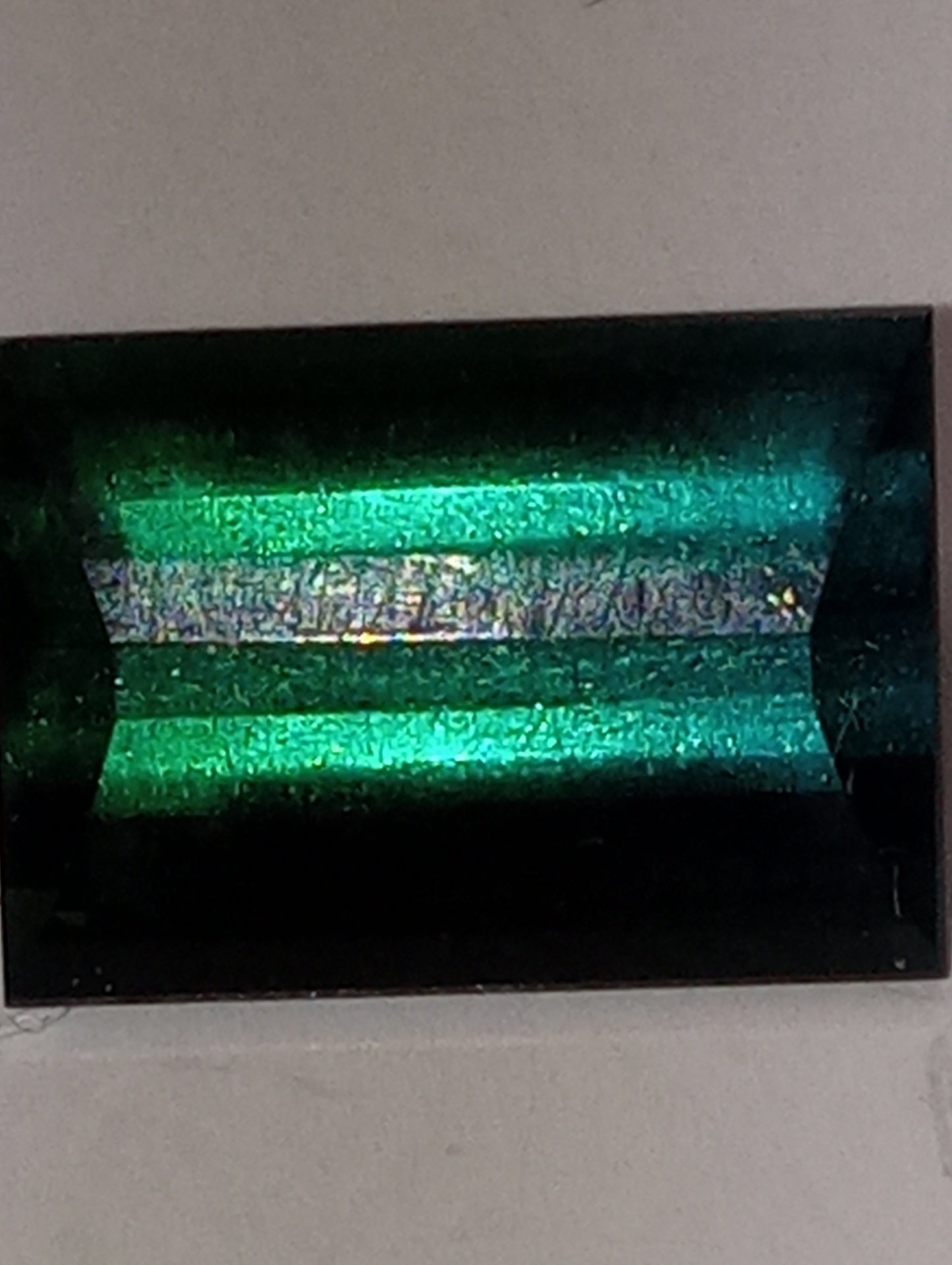 tourmaline gemstone bluish green emerald cut 13x9mm
