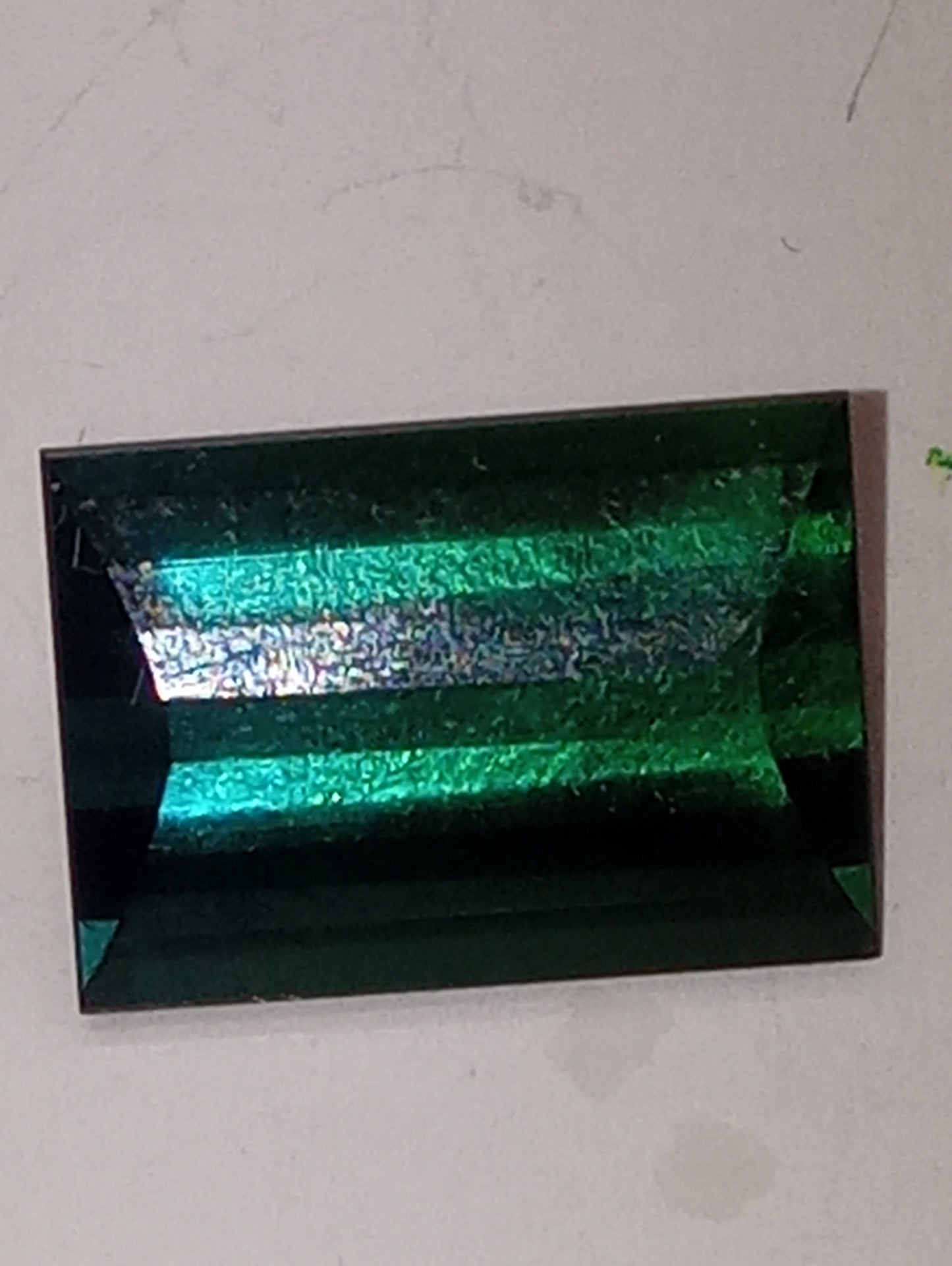 tourmaline gemstone bluish green emerald cut 13x9mm
