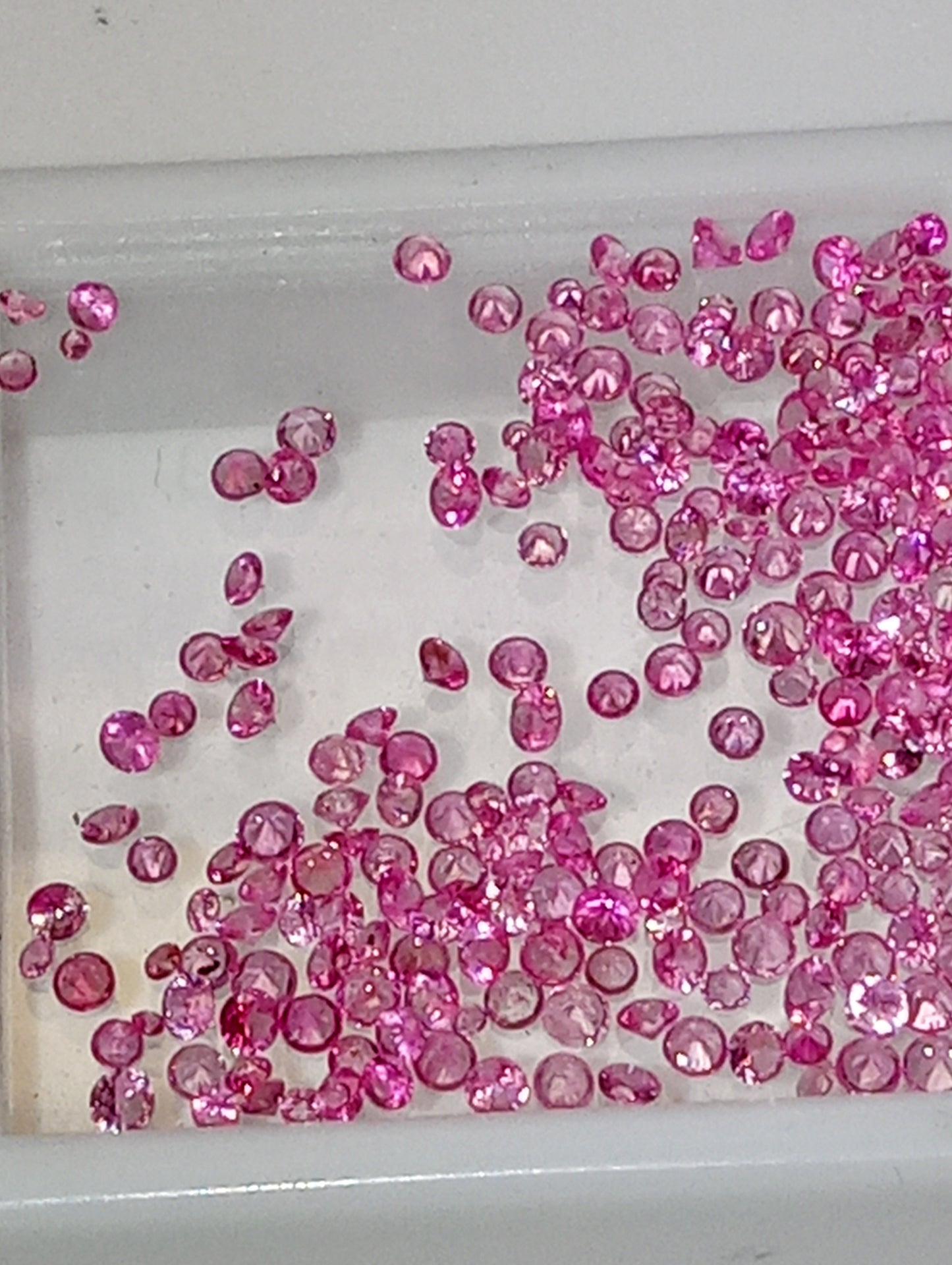 sapphire pink gemstones 1-2mm round cut    100plus stones