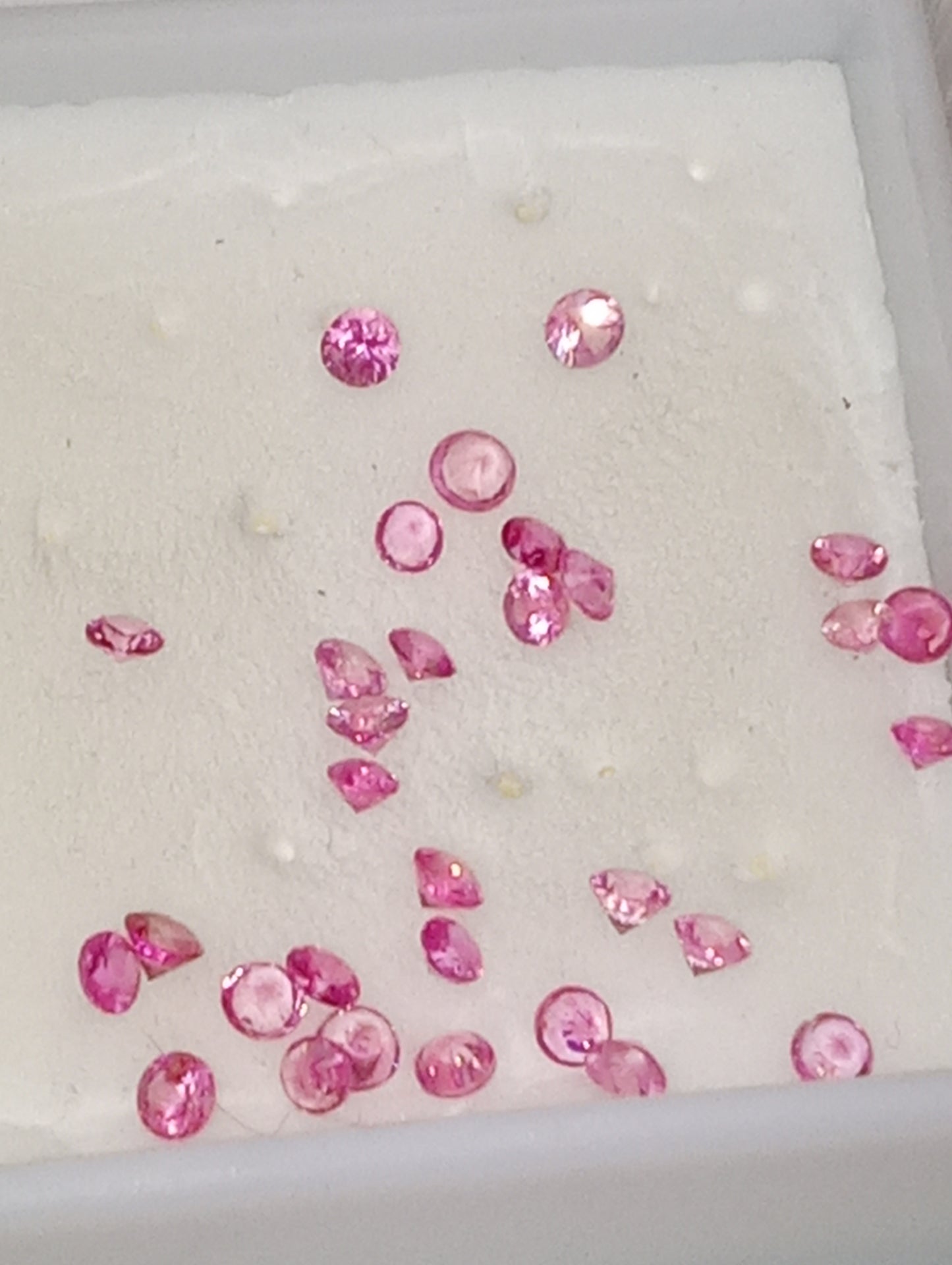 sapphire pink gemstones  apx 2mm rounds  30 stones