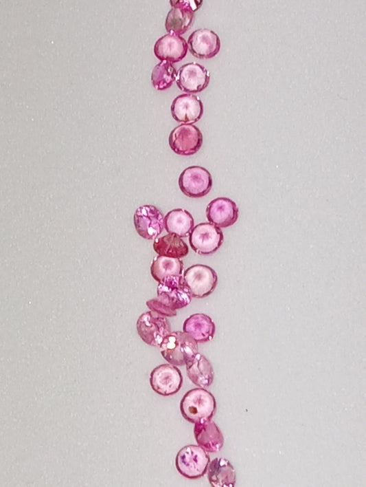 sapphire pink gemstones  apx 2mm rounds  30 stones