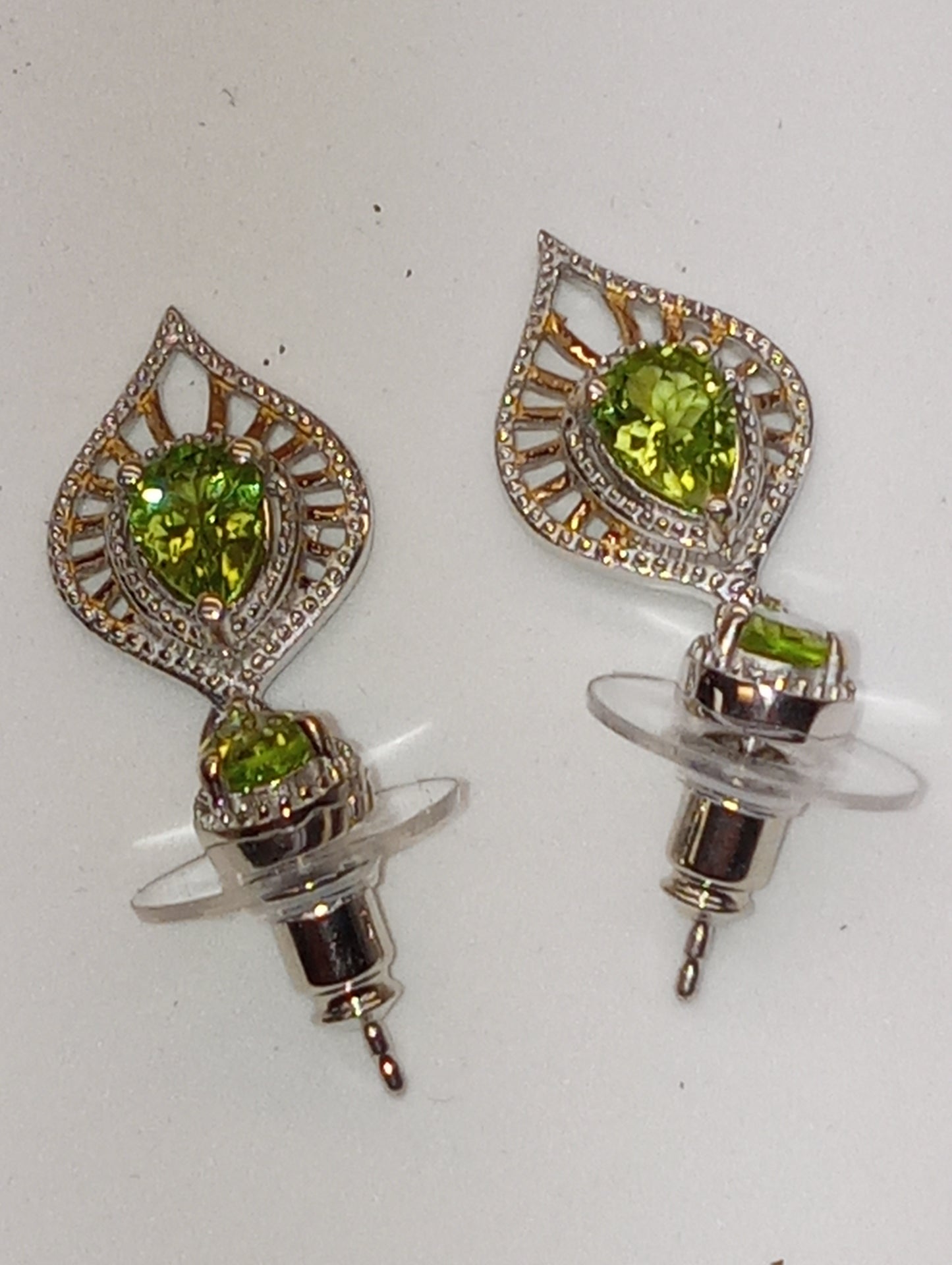 earrings peridot dangle in platinum over sterling silver