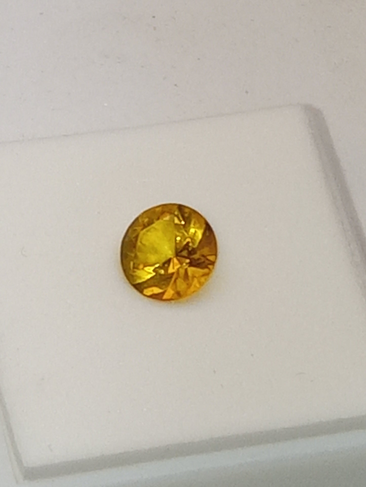 amber Baltic gemstone , yellow,  faceted 8mm round cut, .63ct