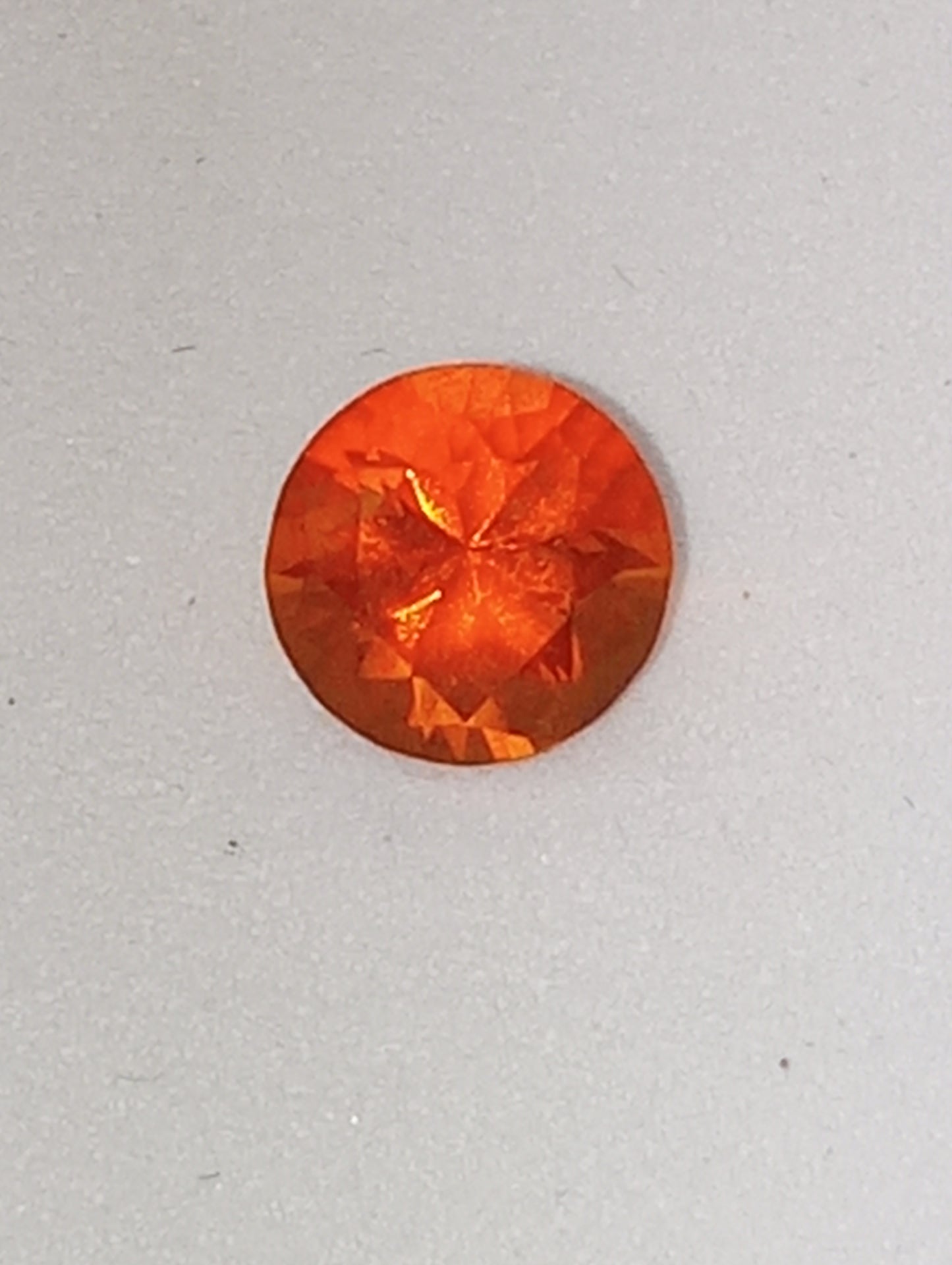 opal gemstone Mexican fire orange neon 7mmround cut