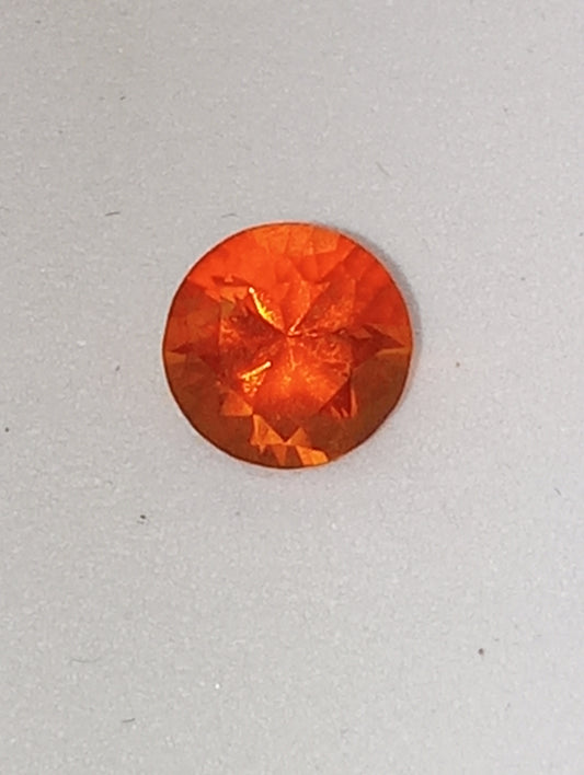 opal gemstone Mexican fire orange neon 7mmround cut
