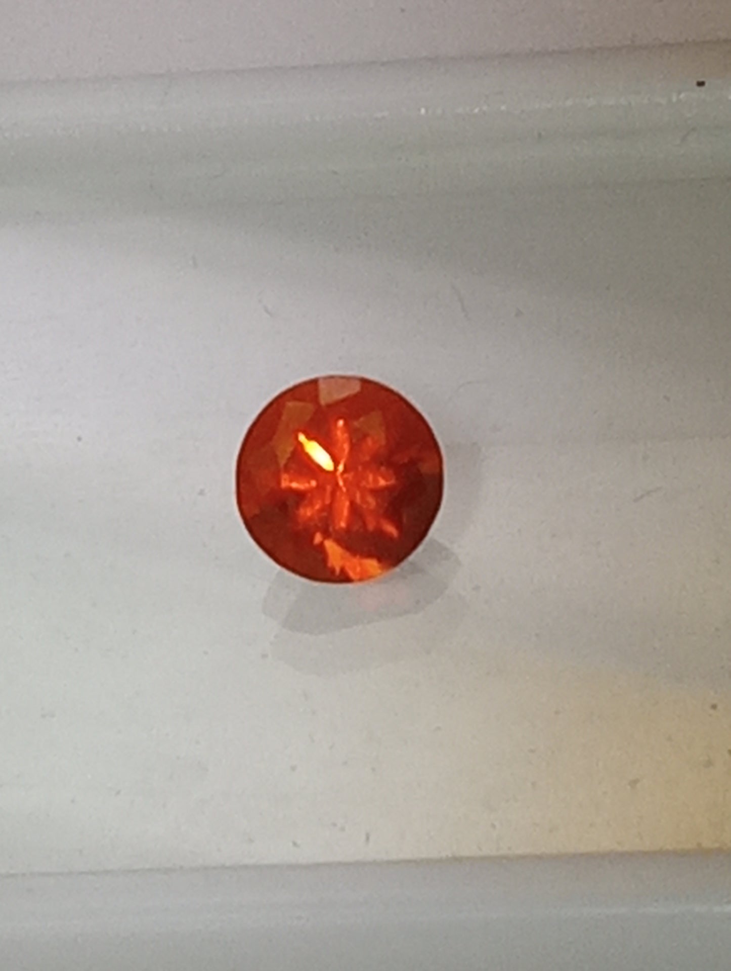 opal gemstone Mexican fire orange neon 7mmround cut