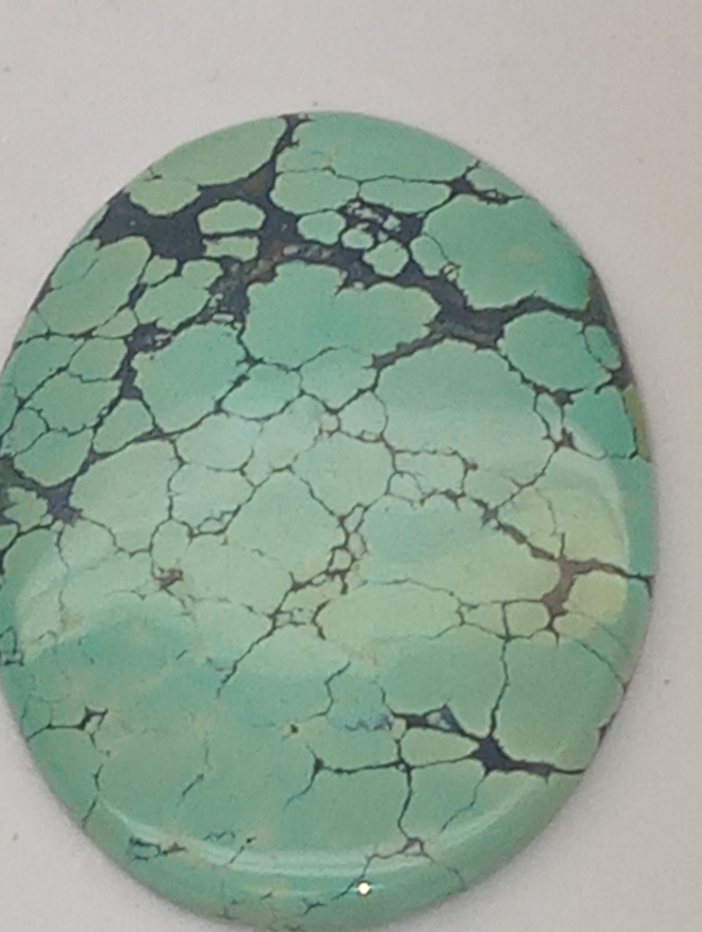 turquoise gemstone Chinese  58.80ct  47mmx34mm 0val