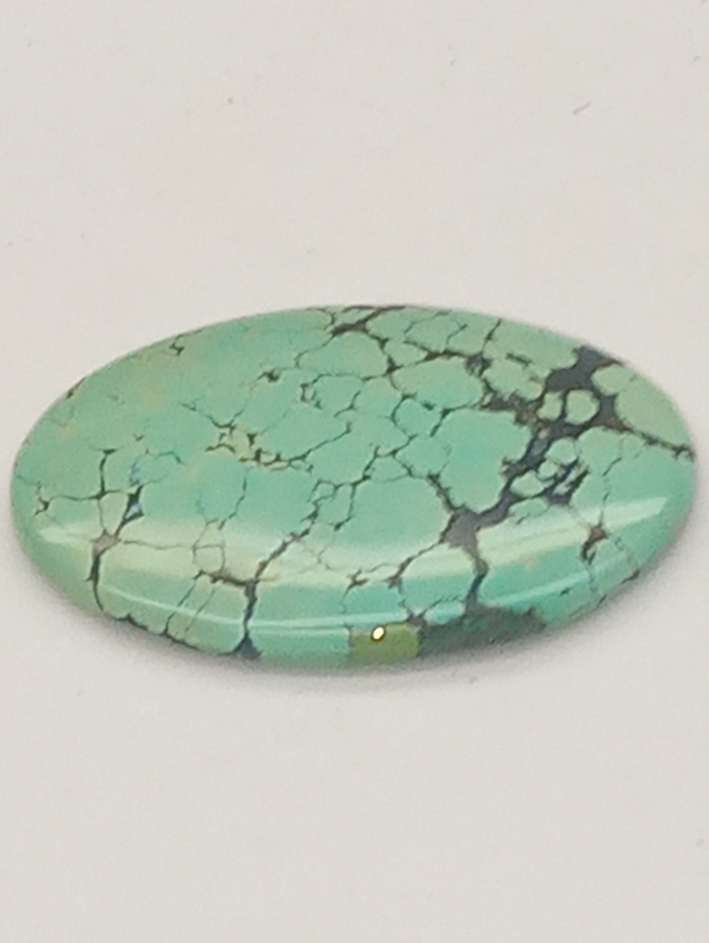 turquoise gemstone Chinese  58.80ct  47mmx34mm 0val