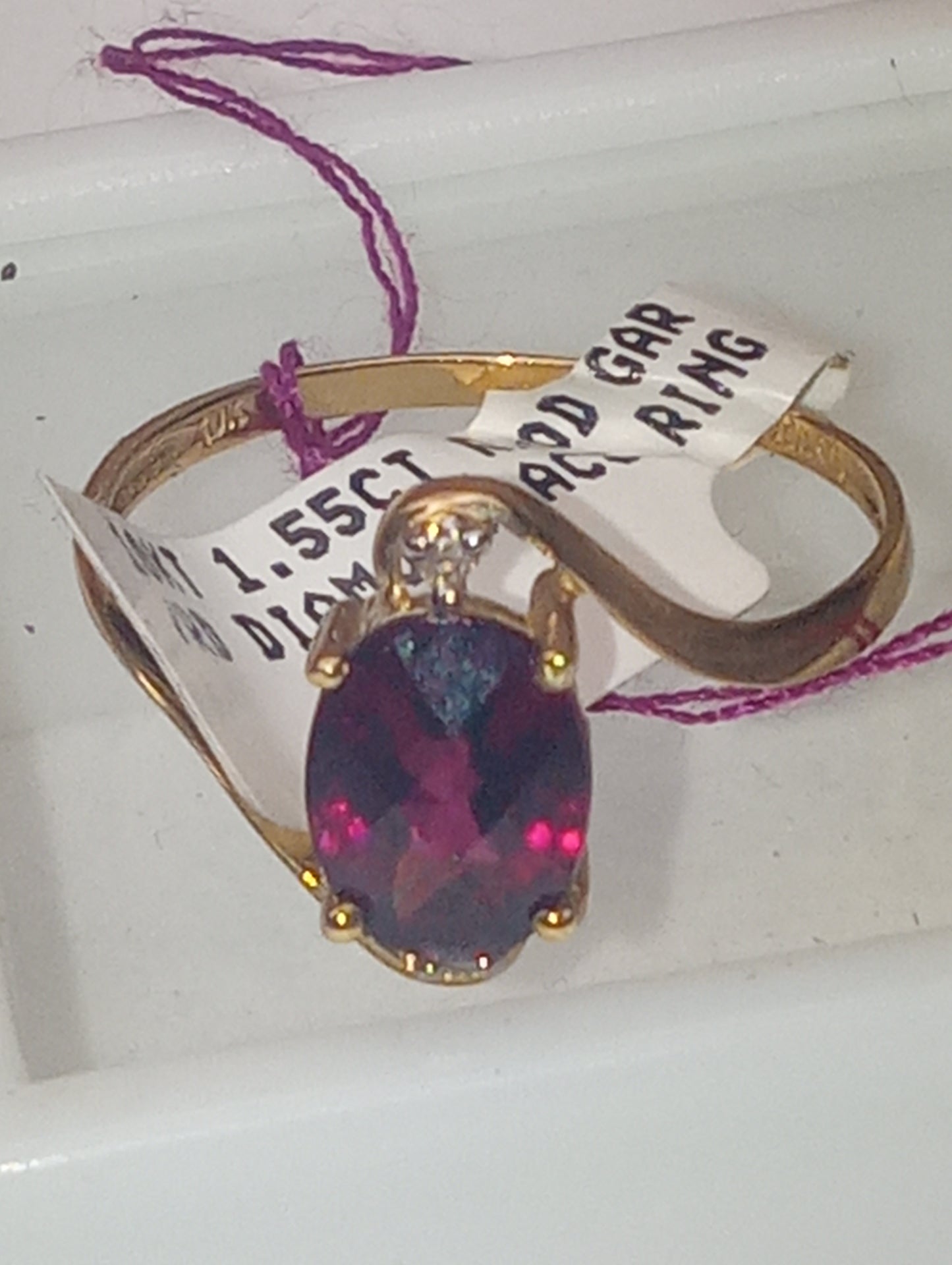 ring garnet rhodolite oval diamond in 10k yellow gold