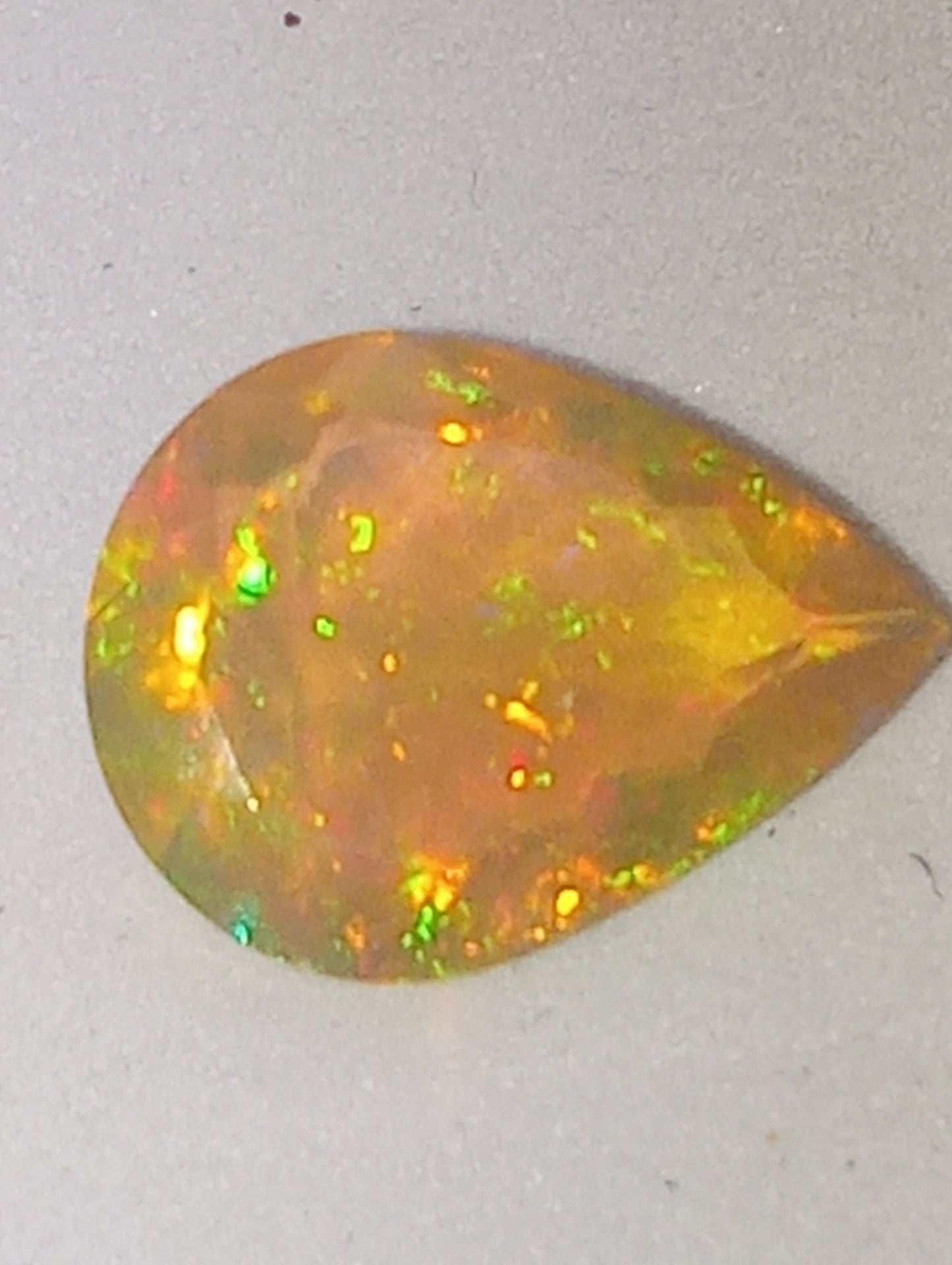 opal gemstone Ethiopian pear shape faceted, 12mmx9mm
