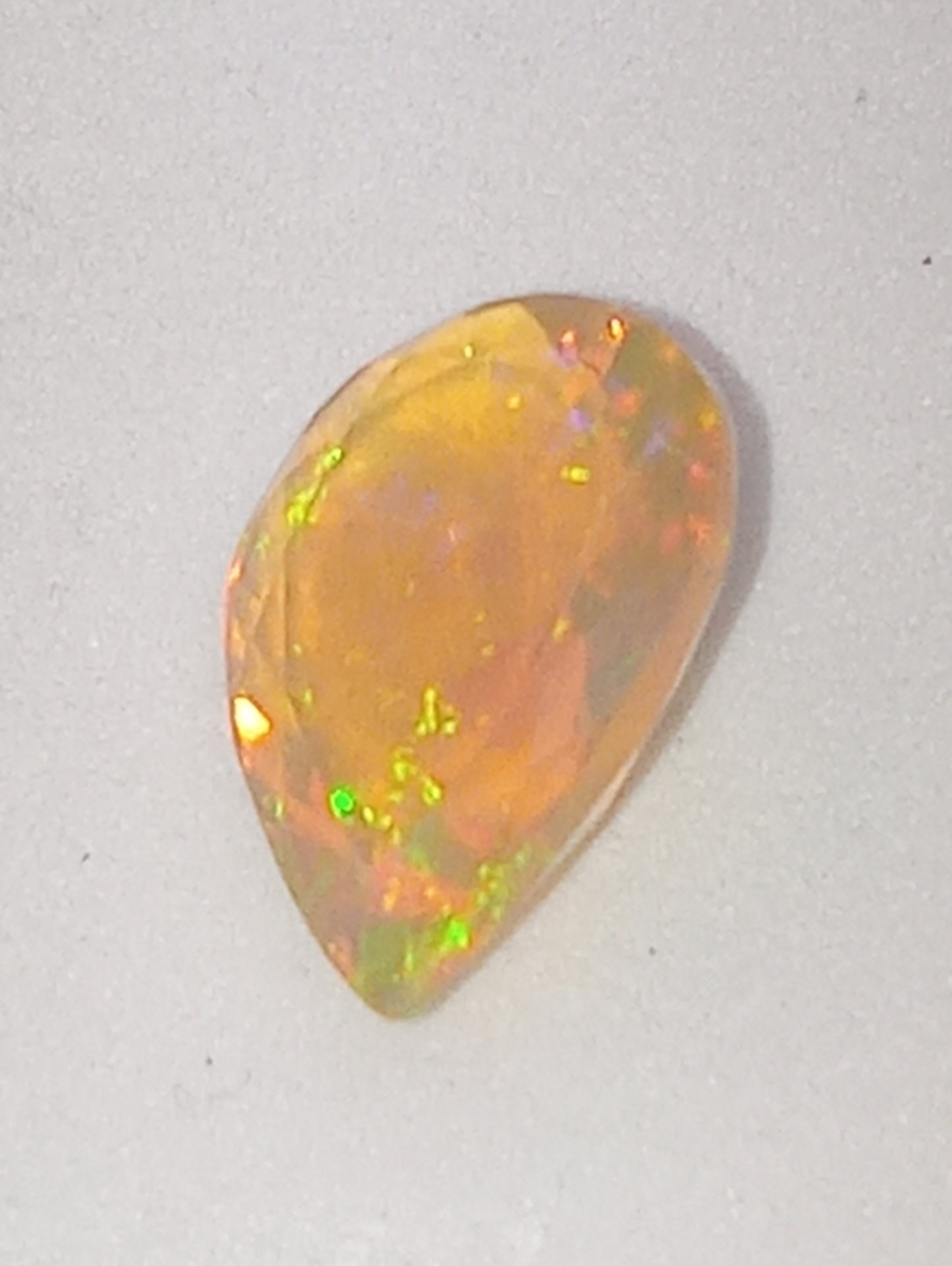 opal gemstone Ethiopian pear shape faceted, 12mmx9mm