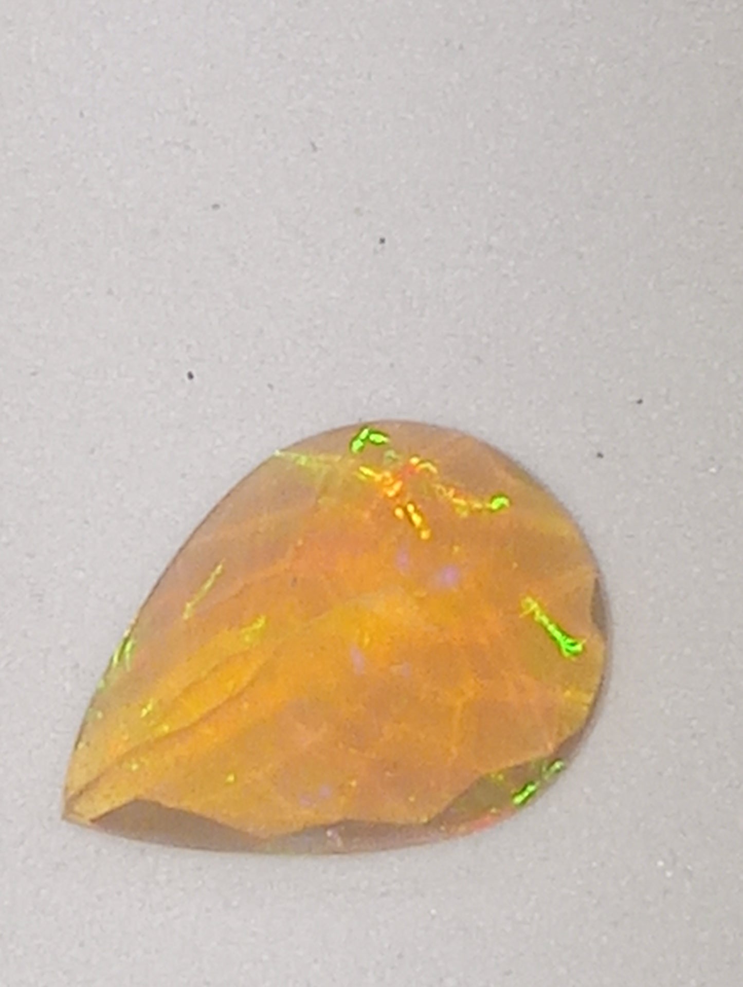 opal gemstone Ethiopian pear shape faceted, 12mmx9mm