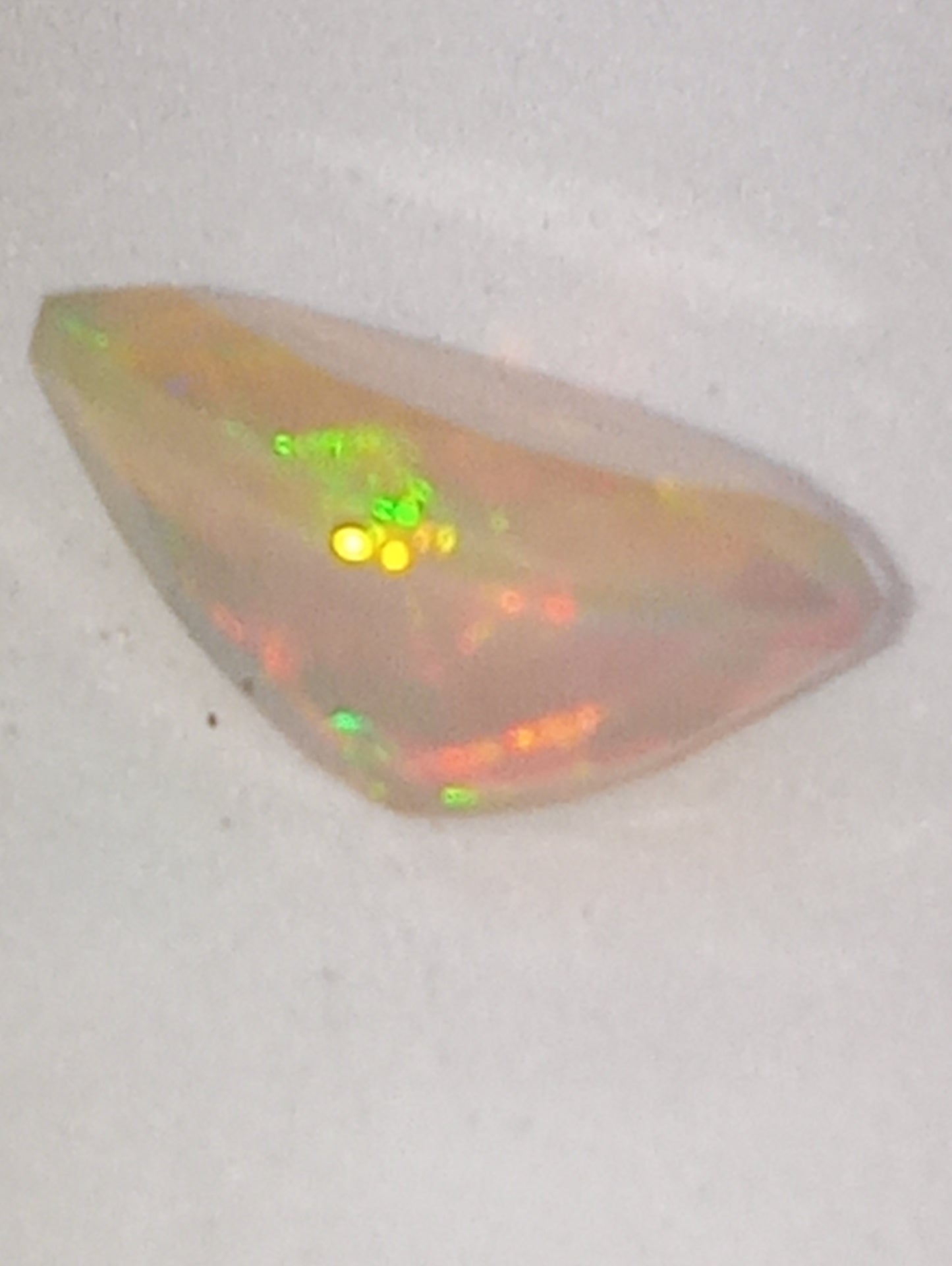 opal Ethiopian gemstone, pear shape, 14mmx10mm, green flash faceted