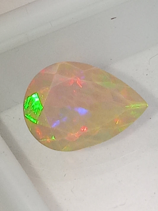 opal Ethiopian gemstone, pear shape, 14mmx10mm, green flash faceted