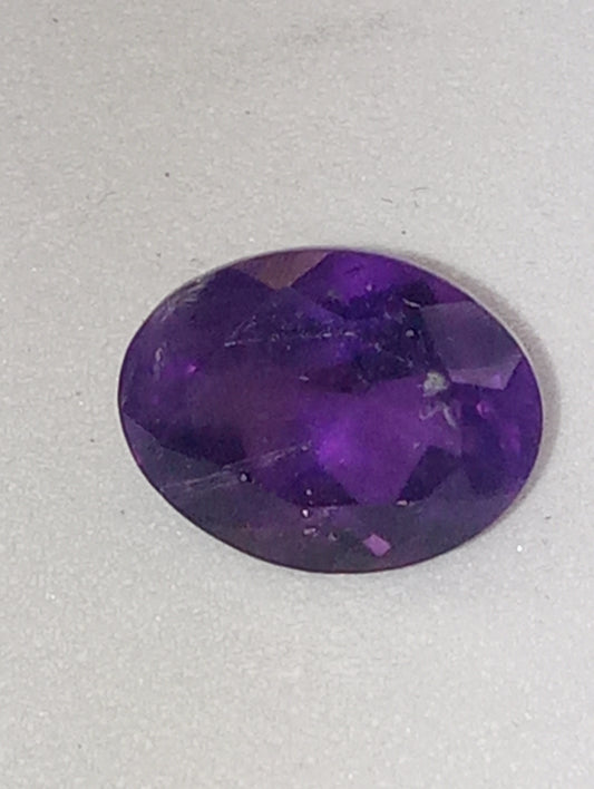 amethyst gemstone, dark, 8mmx6mm oval shape, 1.71ct