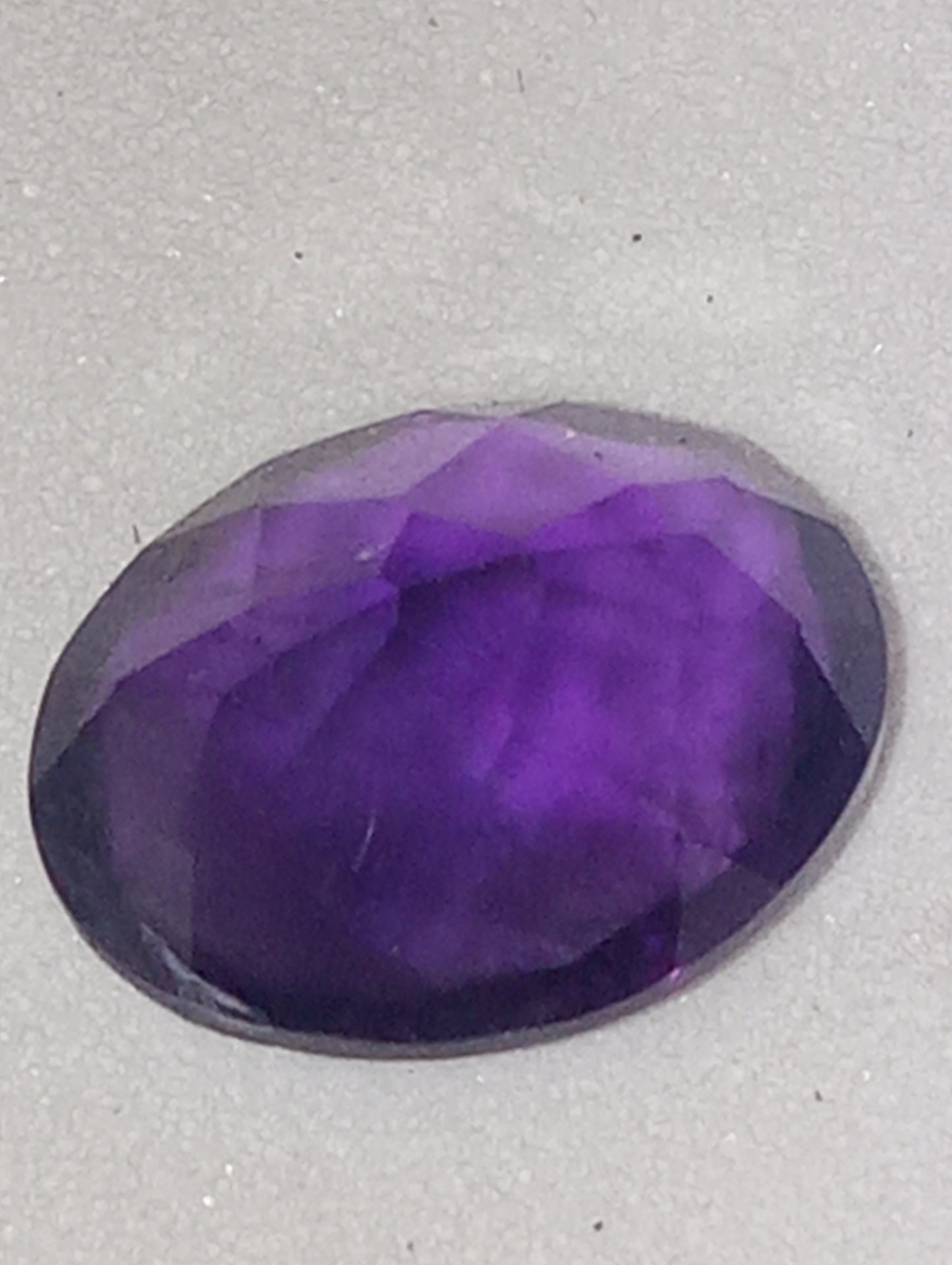 amethyst gemstone, dark, 8mmx6mm oval shape, 1.71ct