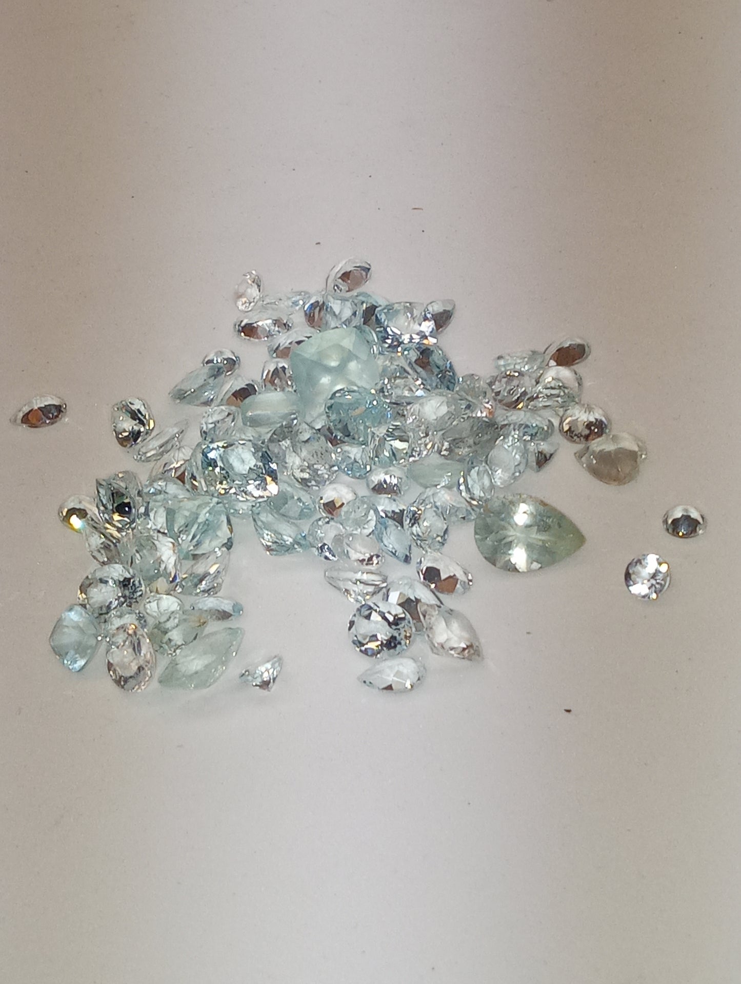 aquamarine gemstones light mixed shapes