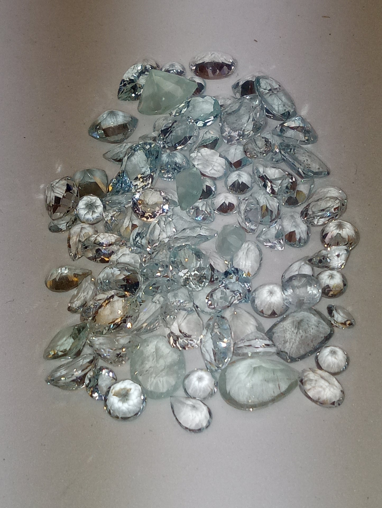 aquamarine gemstones light mixed shapes