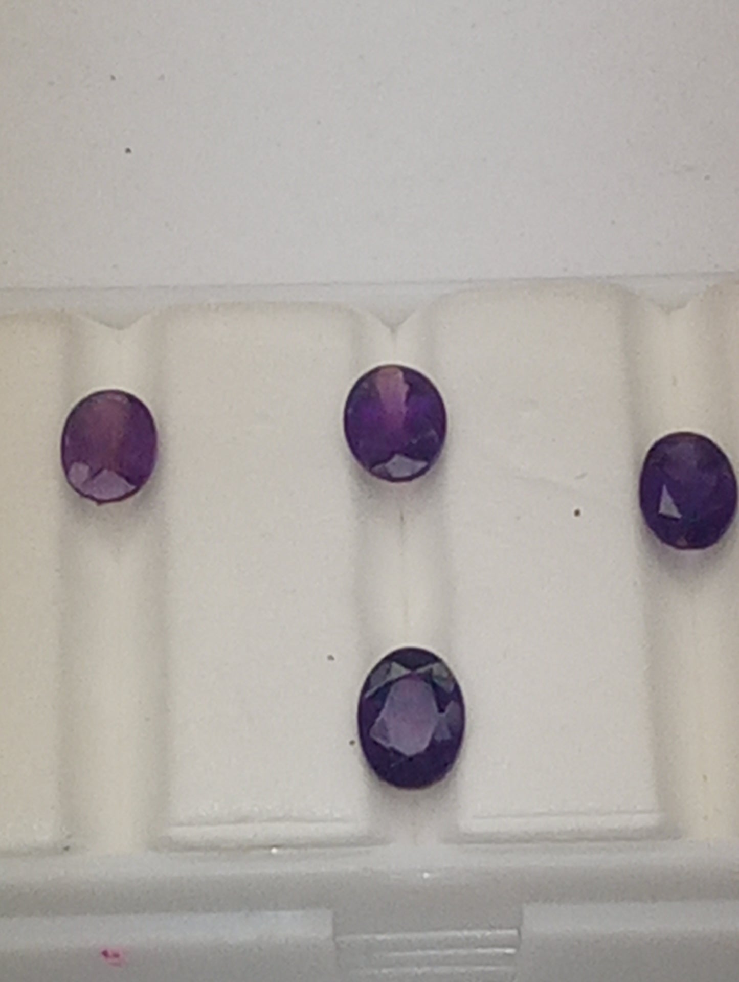 amethyst gemstones ovals 7mmx5mm, 4 stones  dark