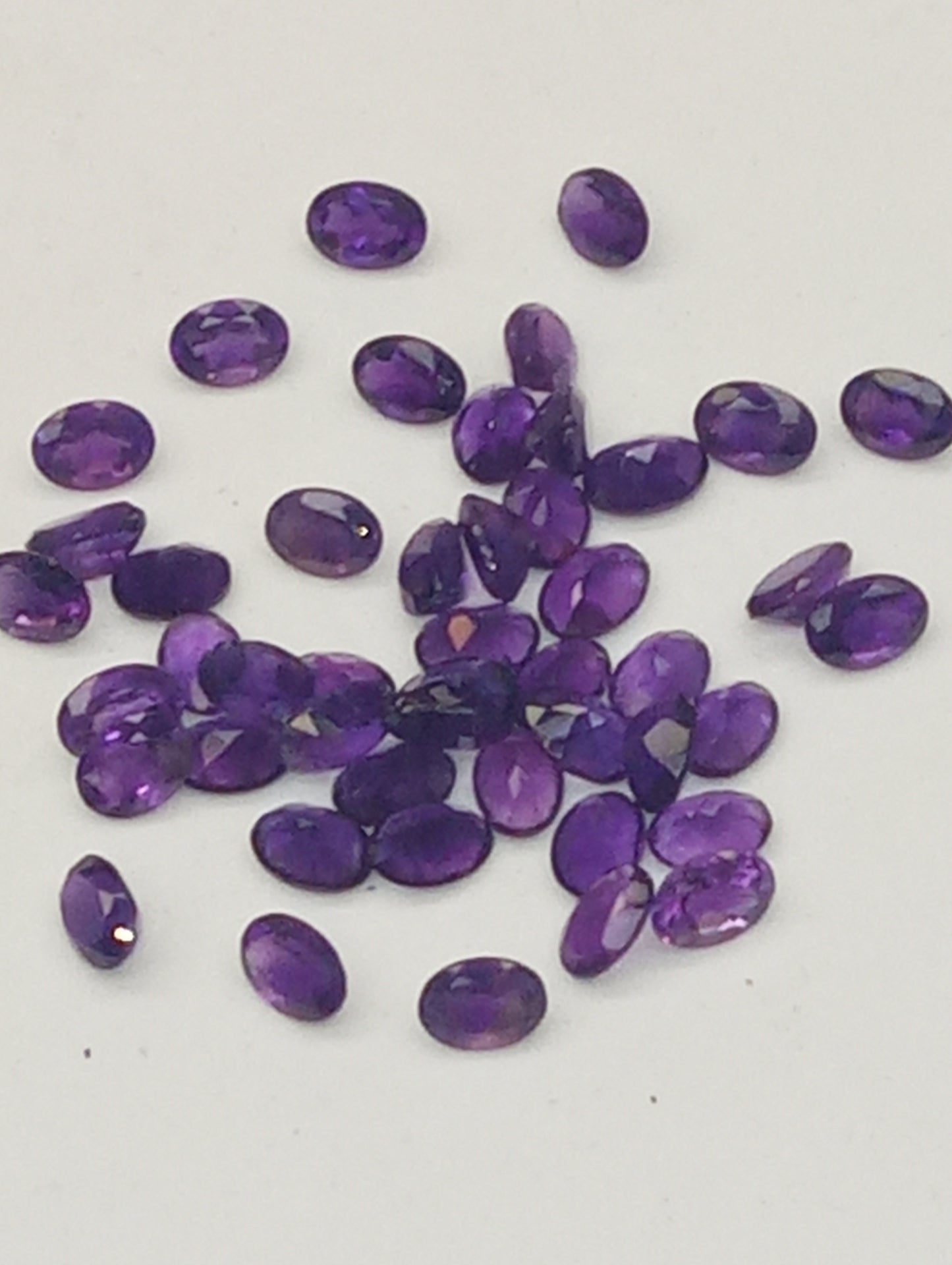 amethyst gemstones dark oval shape, 7mmx5mm, 47 stones