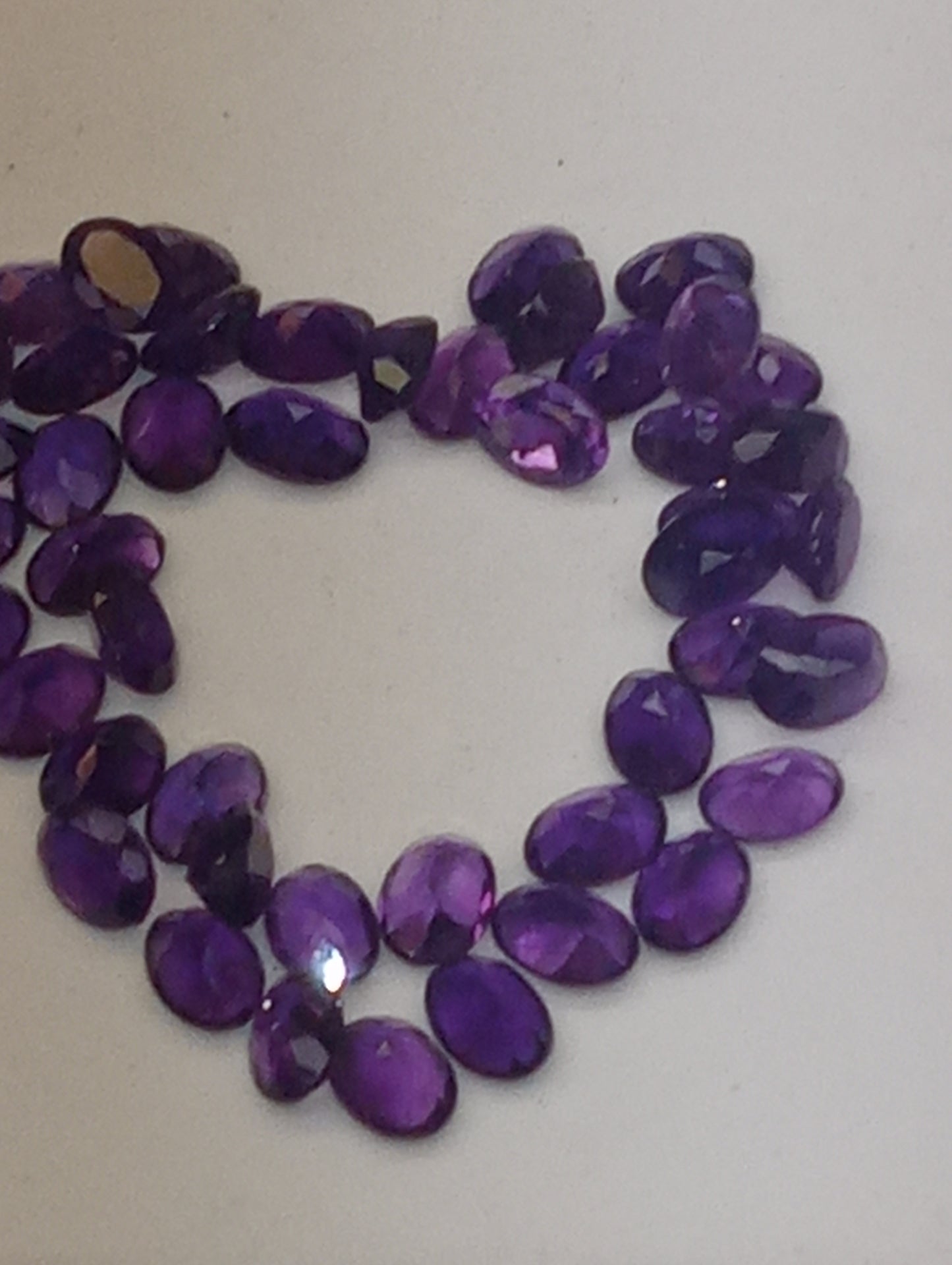 amethyst gemstones dark oval shape, 7mmx5mm, 47 stones