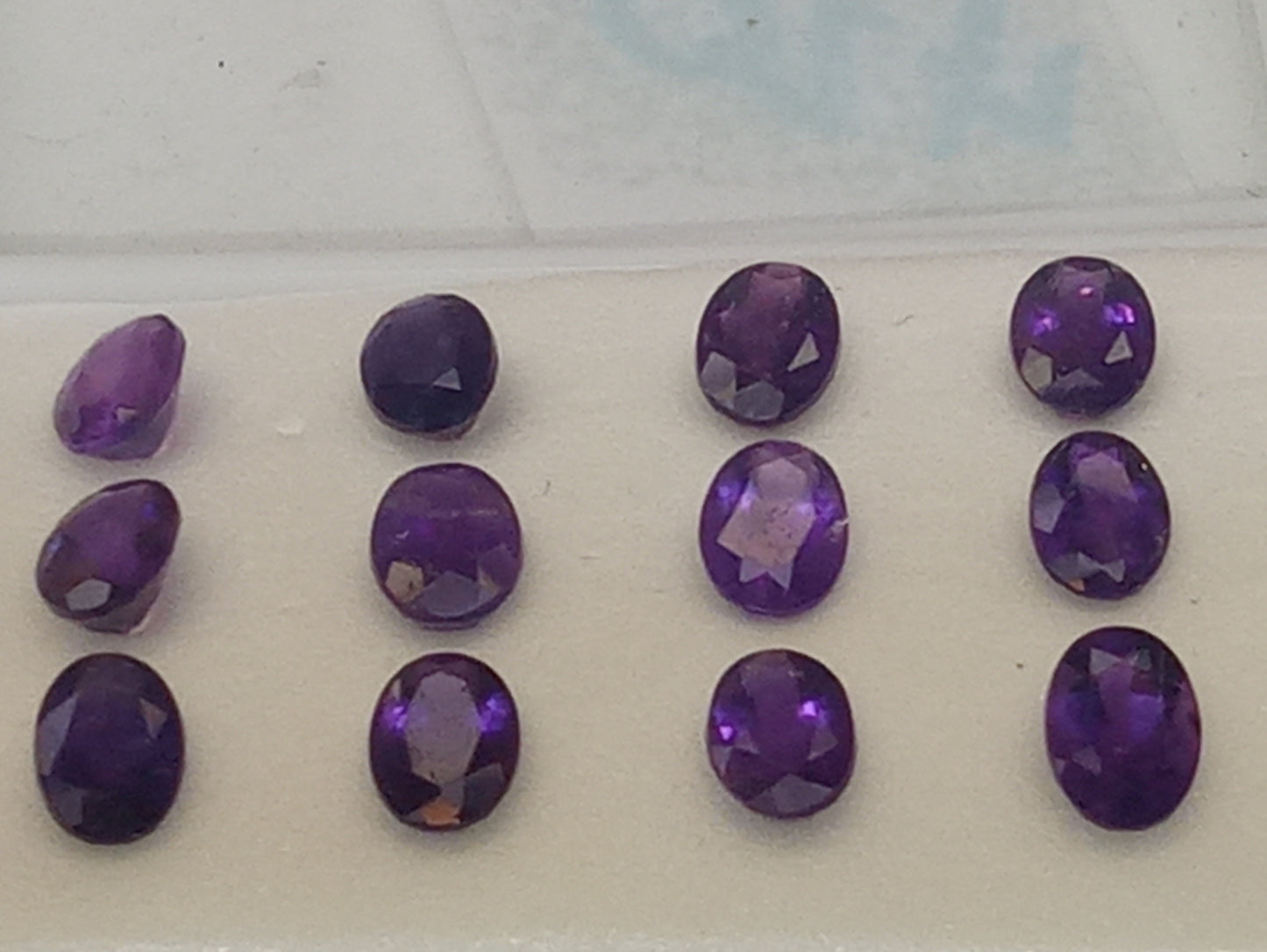amethyst gemstones dark 7mmx5mm oval cut, 12 stones