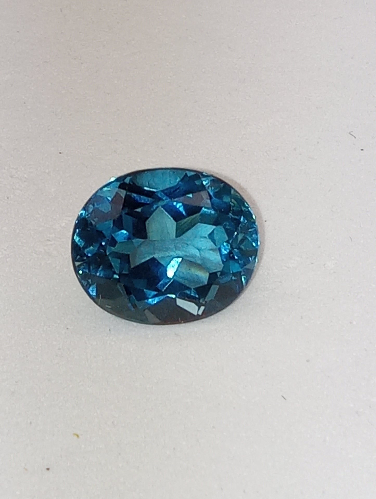 topaz gemstone London blue 12mmx10mm oval cut , Sri Lanka