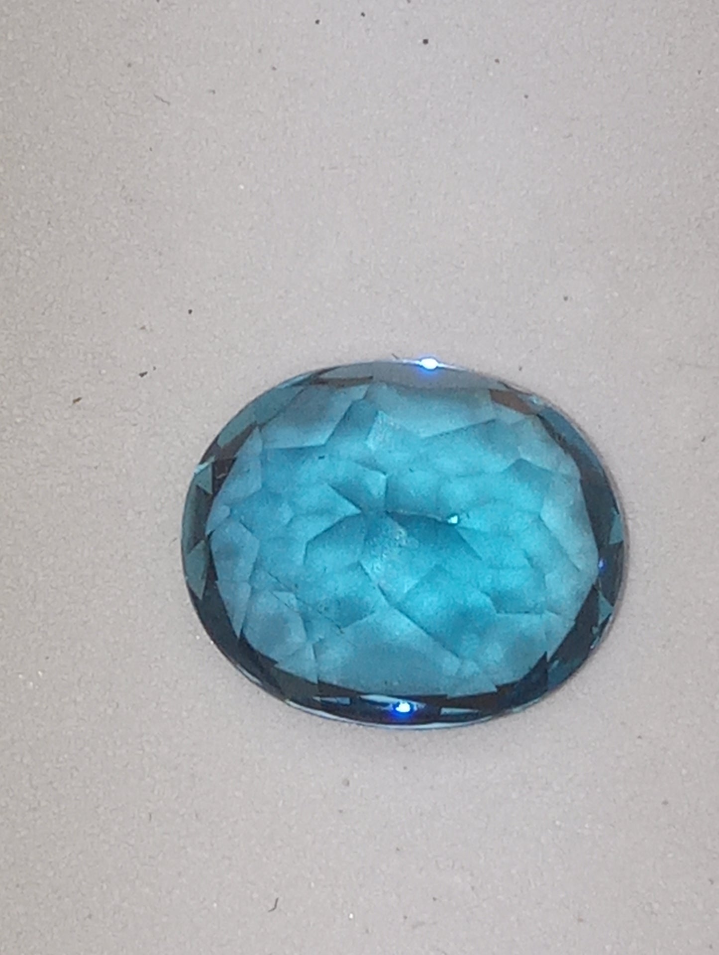 topaz gemstone London blue 12mmx10mm oval cut , Sri Lanka