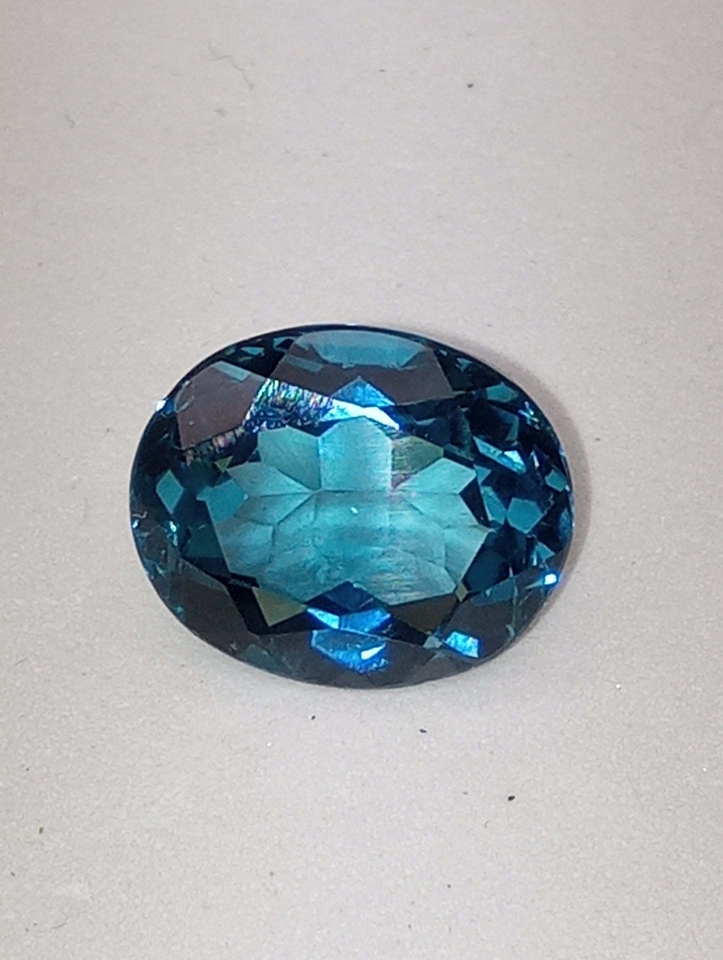topaz gemstone London blue from Sri Lanka, 12mmx10mm oval cut