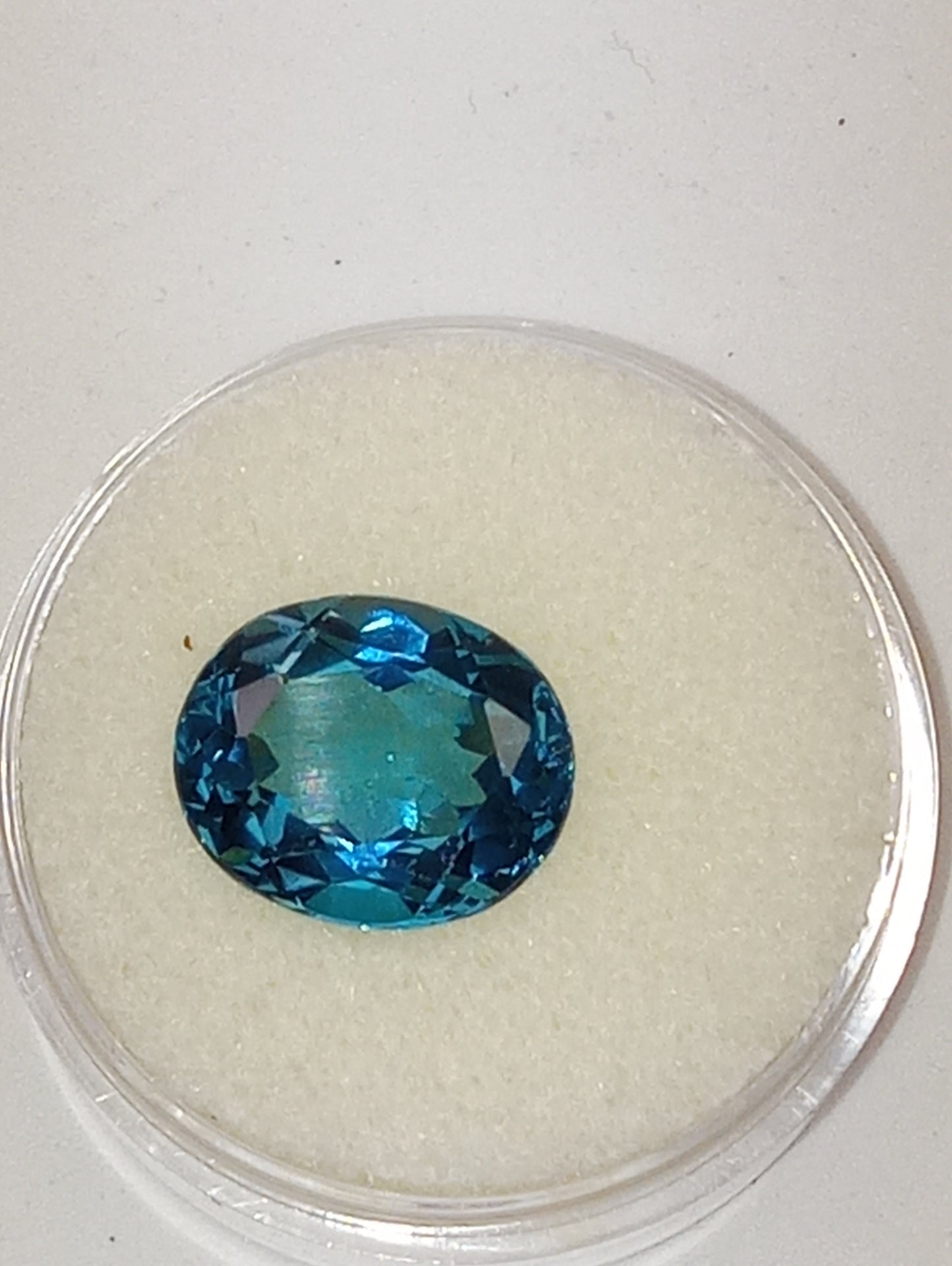 topaz gemstone London blue from Sri Lanka, 12mmx10mm oval cut