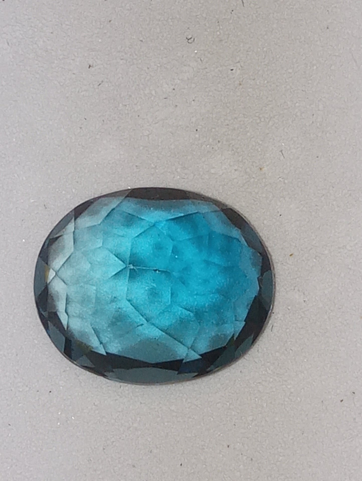 topaz gemstone London blue from Sri Lanka, 12mmx10mm oval cut