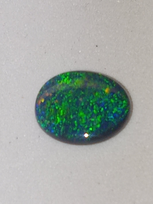 opal gemstone,  black Lightning Ridge .83ct,  8.5mmx6.5mm