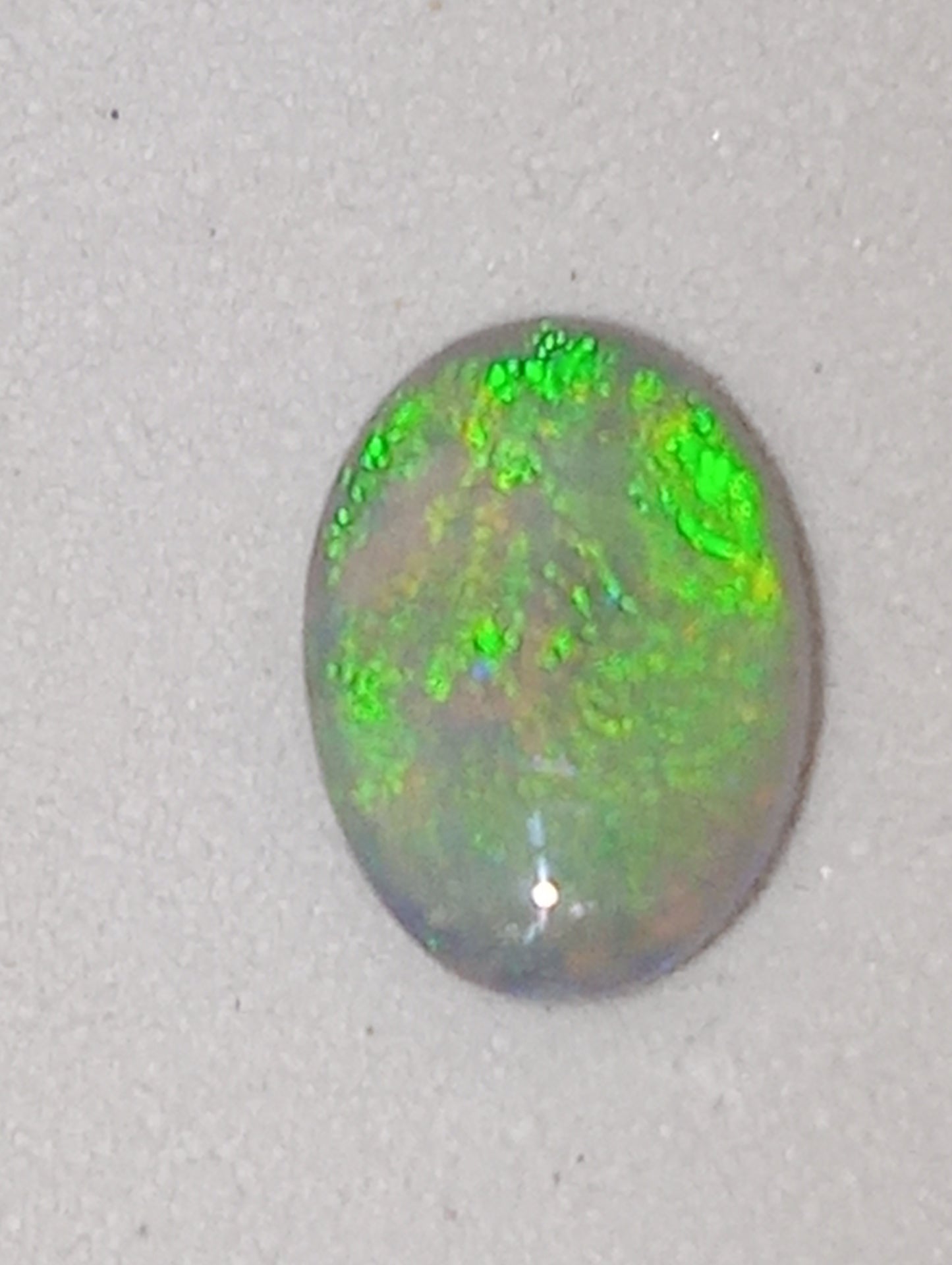 opal gemstone Mintabie gray based, .46ct oval