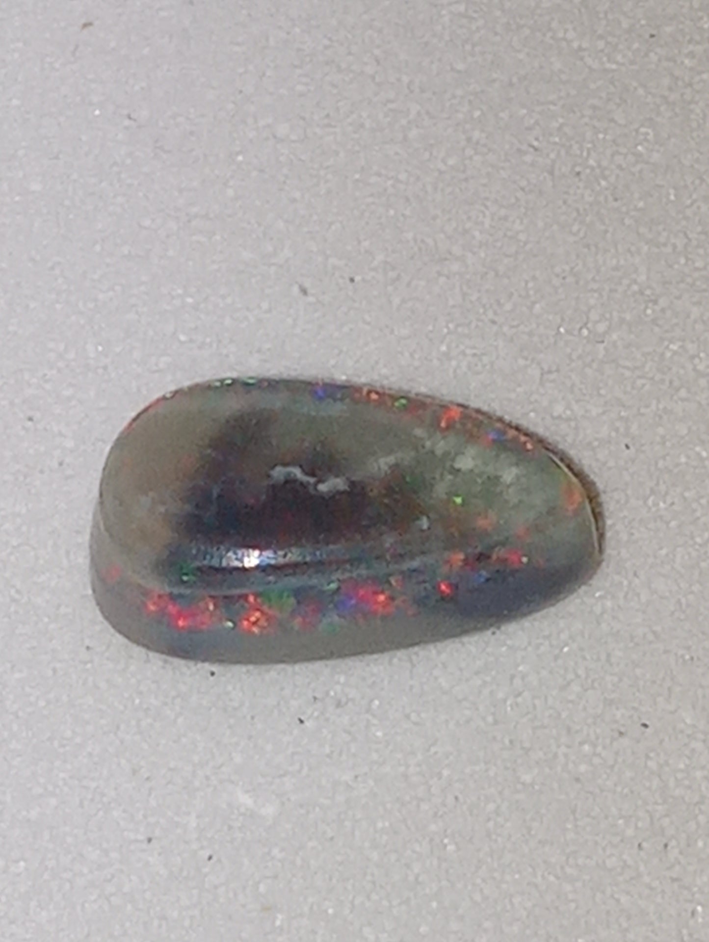 opal gemstone Lightning Ridge black .70ct , 8.5mmx5mm