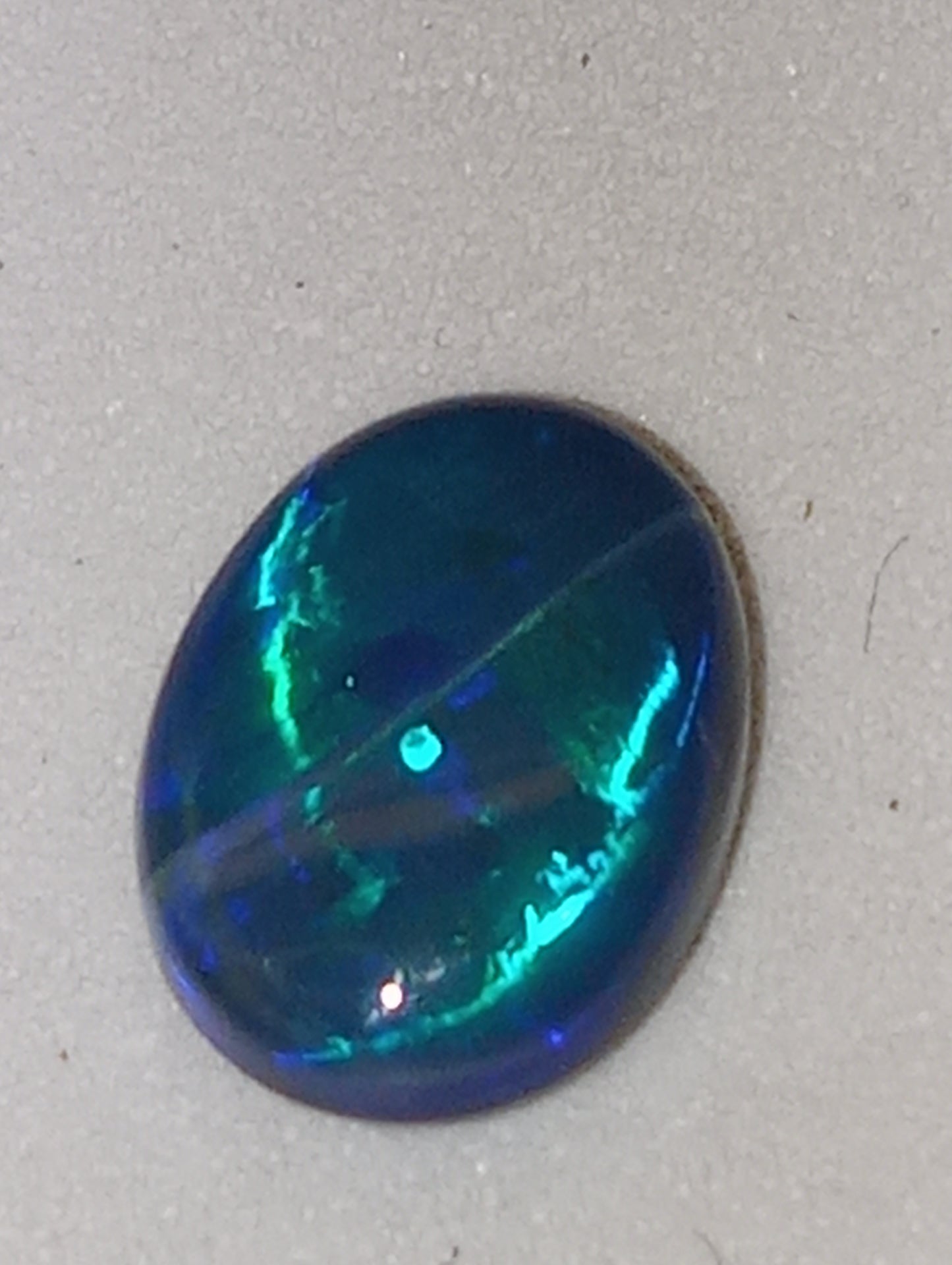 opal gemstone, Lightning Ridge black 10mmx7mm oval, 1.35ct crazed