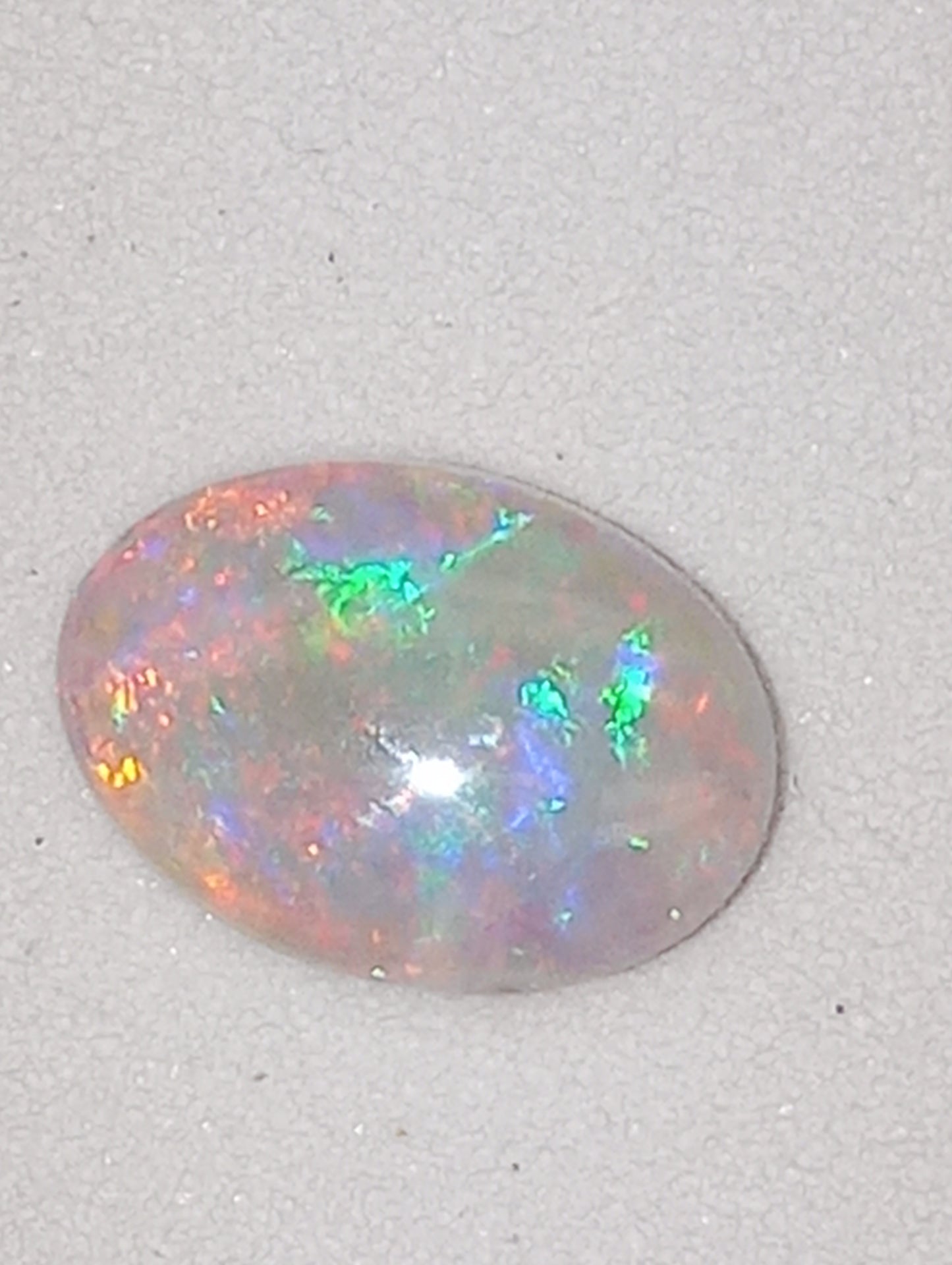 opal gemstone Mintabie gray based oval .56ct