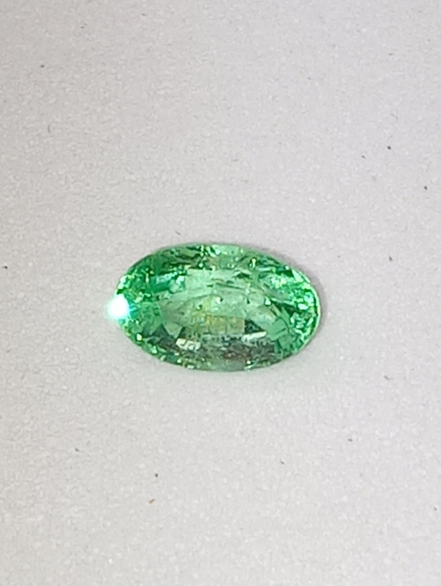 emerald gemstone Colombian oval cut .53ct , 6mmx4mm