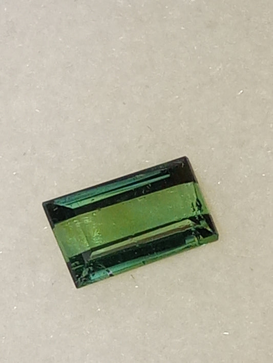 tourmaline gemstone green 6.5mmx4mm emerald cut, .63ct