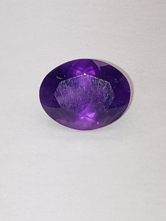 amethyst gemstone dark 9mmx7mm oval shape