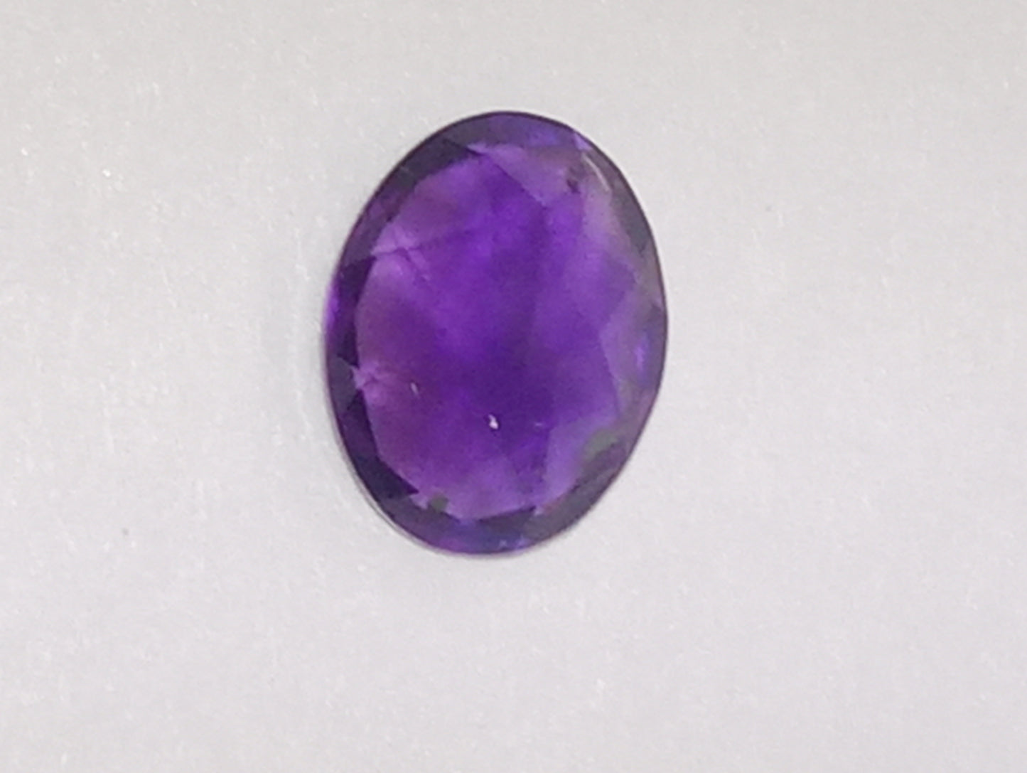 amethyst gemstone dark 9mmx7mm oval shape